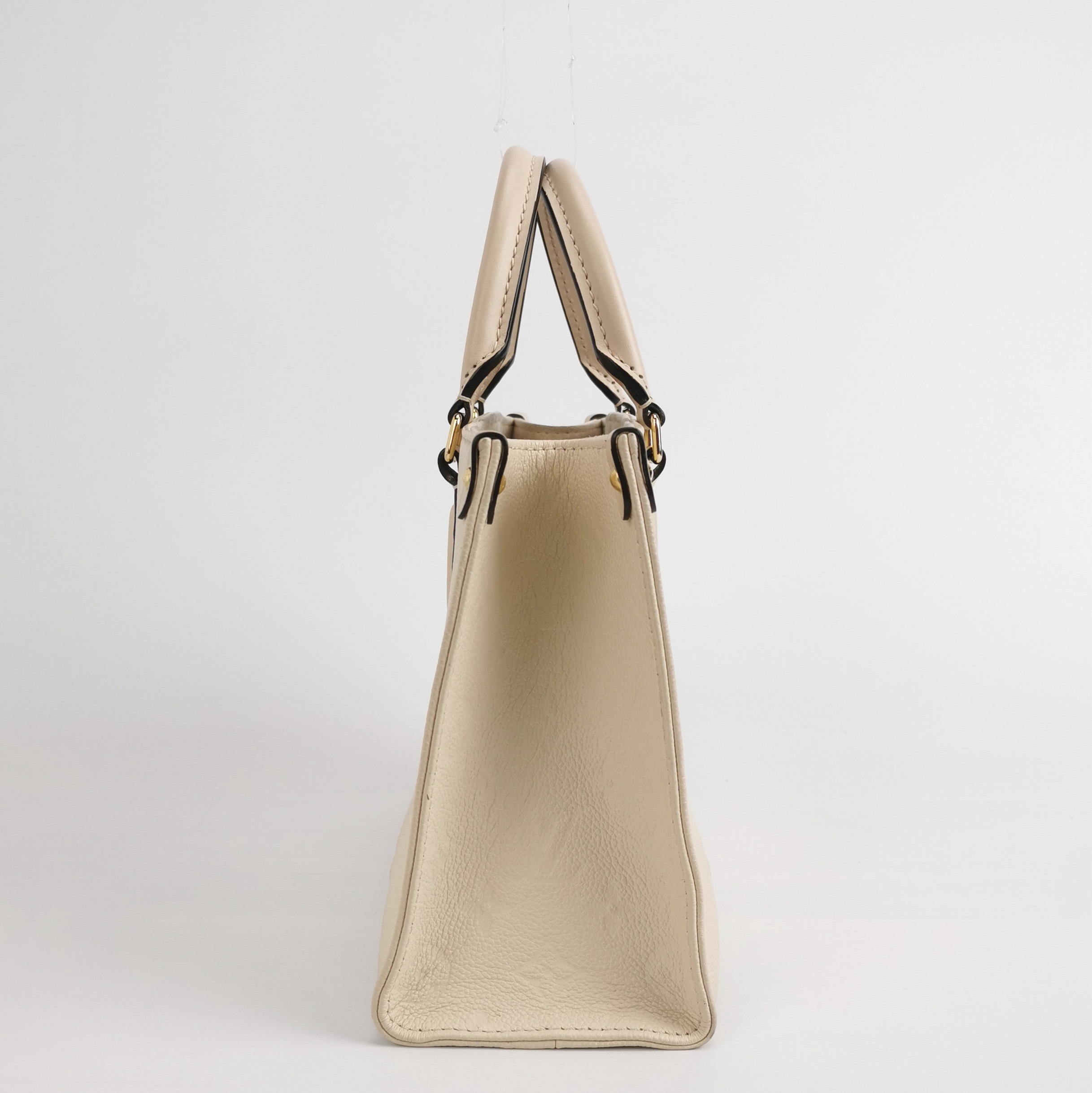 Louis Vuitton(LV) OnTheGo Tote Monogram Empreinte Giant PM — photo 5 of 15