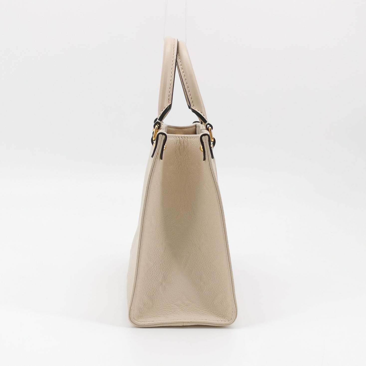 Louis Vuitton(LV) OnTheGo Tote Monogram Empreinte Giant PM — photo 5 of 16