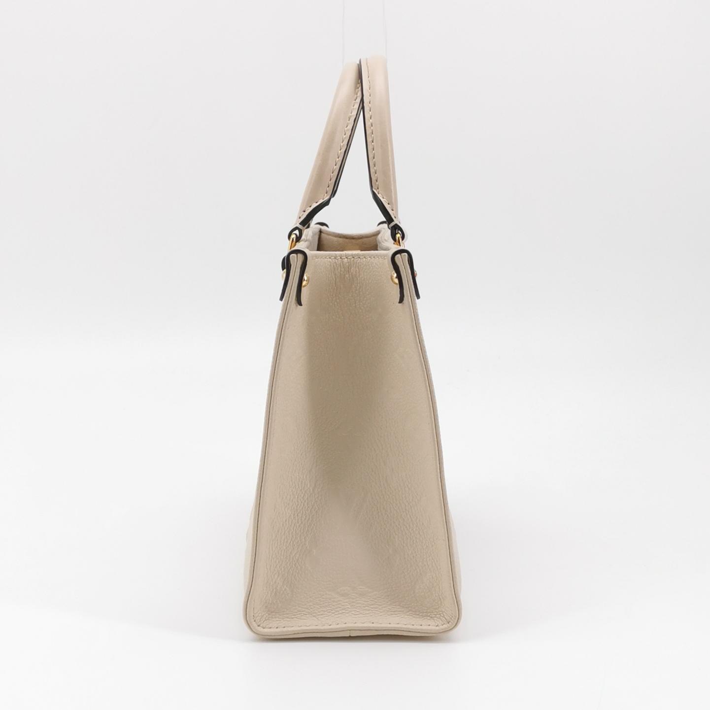 Louis Vuitton(LV) OnTheGo Tote Monogram Empreinte Giant PM — photo 4 of 16