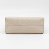 Louis Vuitton(LV) OnTheGo Tote Monogram Empreinte Giant PM — thumbnail 6