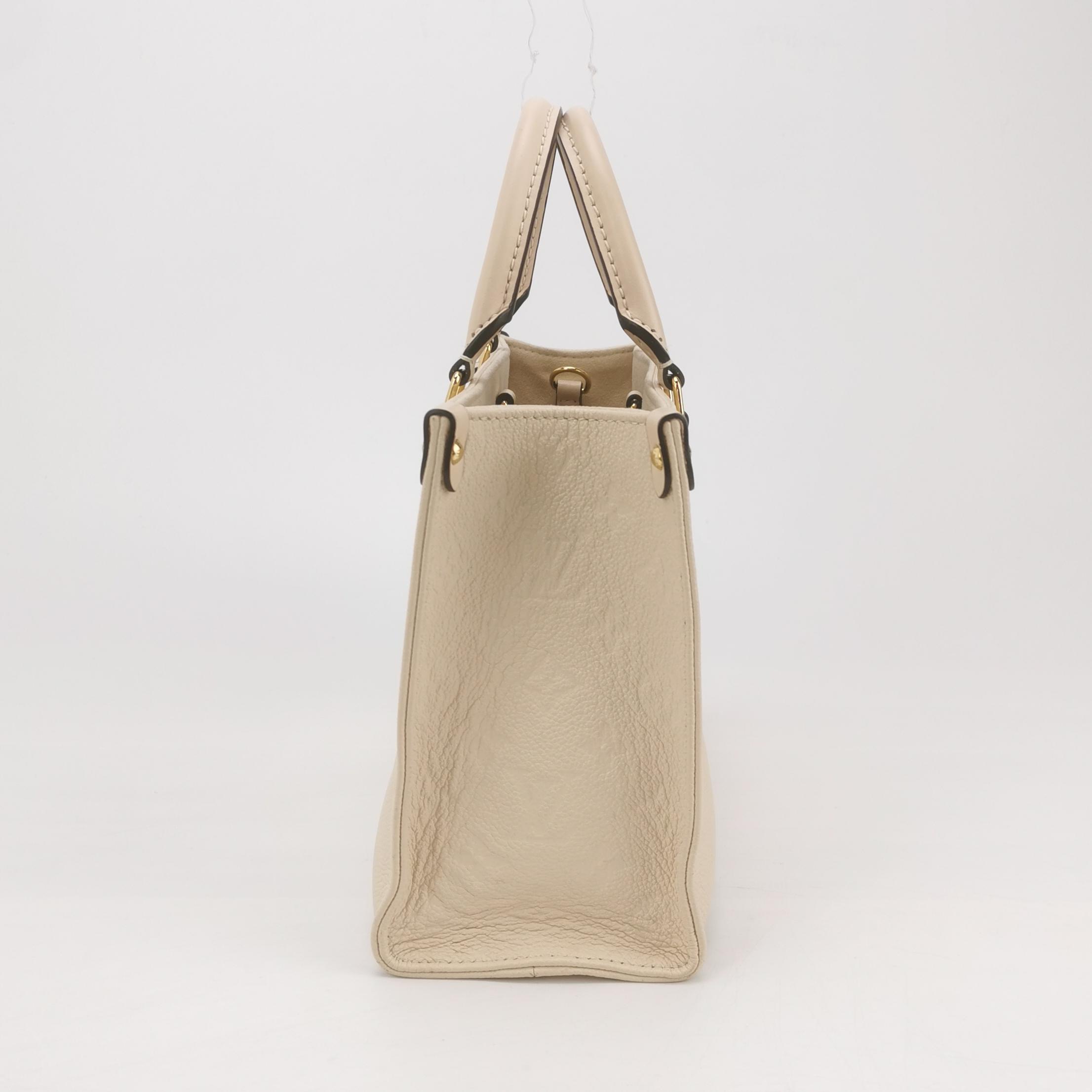 Louis Vuitton(LV) OnTheGo Tote Monogram Empreinte Giant PM — photo 4 of 15