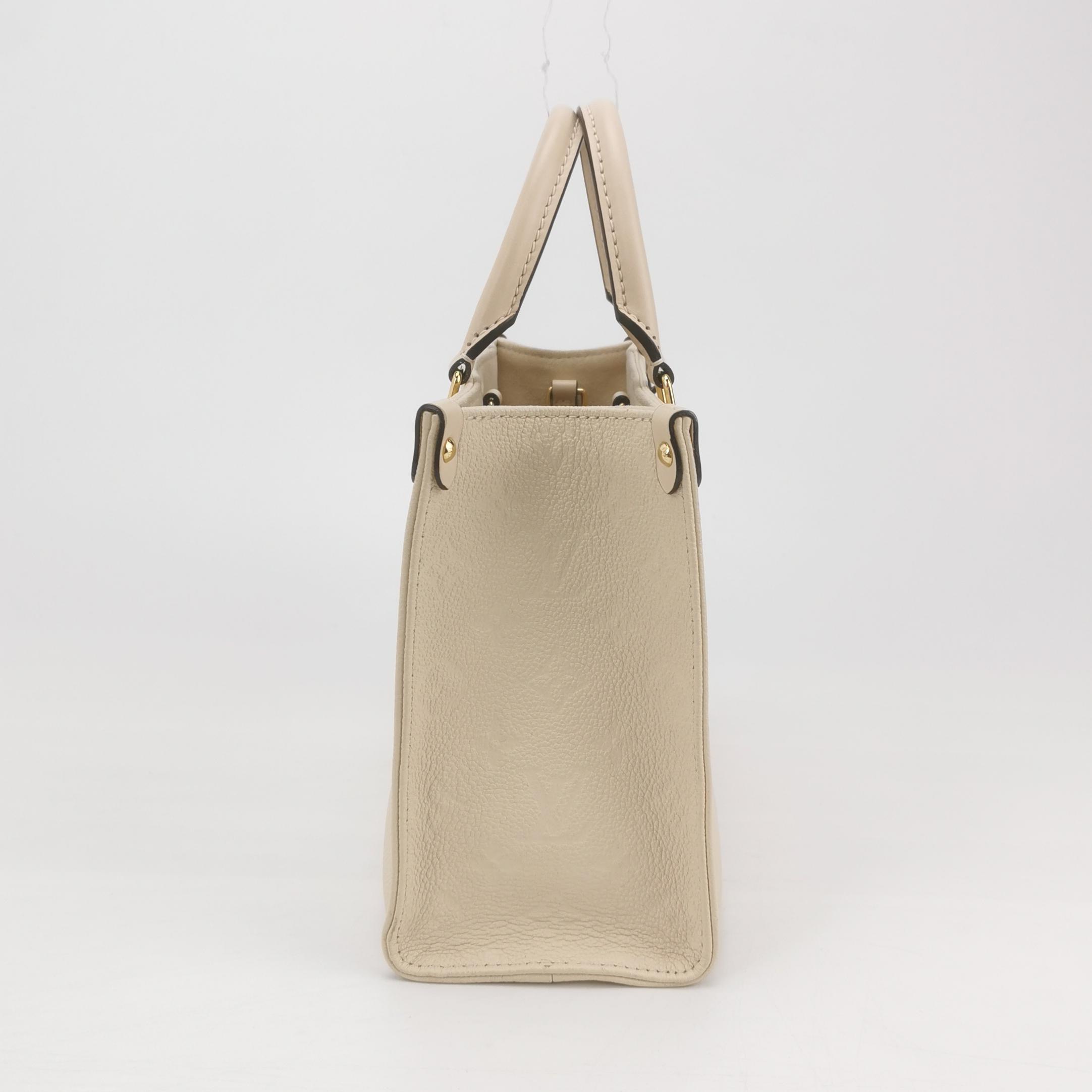 Louis Vuitton(LV) OnTheGo Tote Monogram Empreinte Giant PM — photo 5 of 15