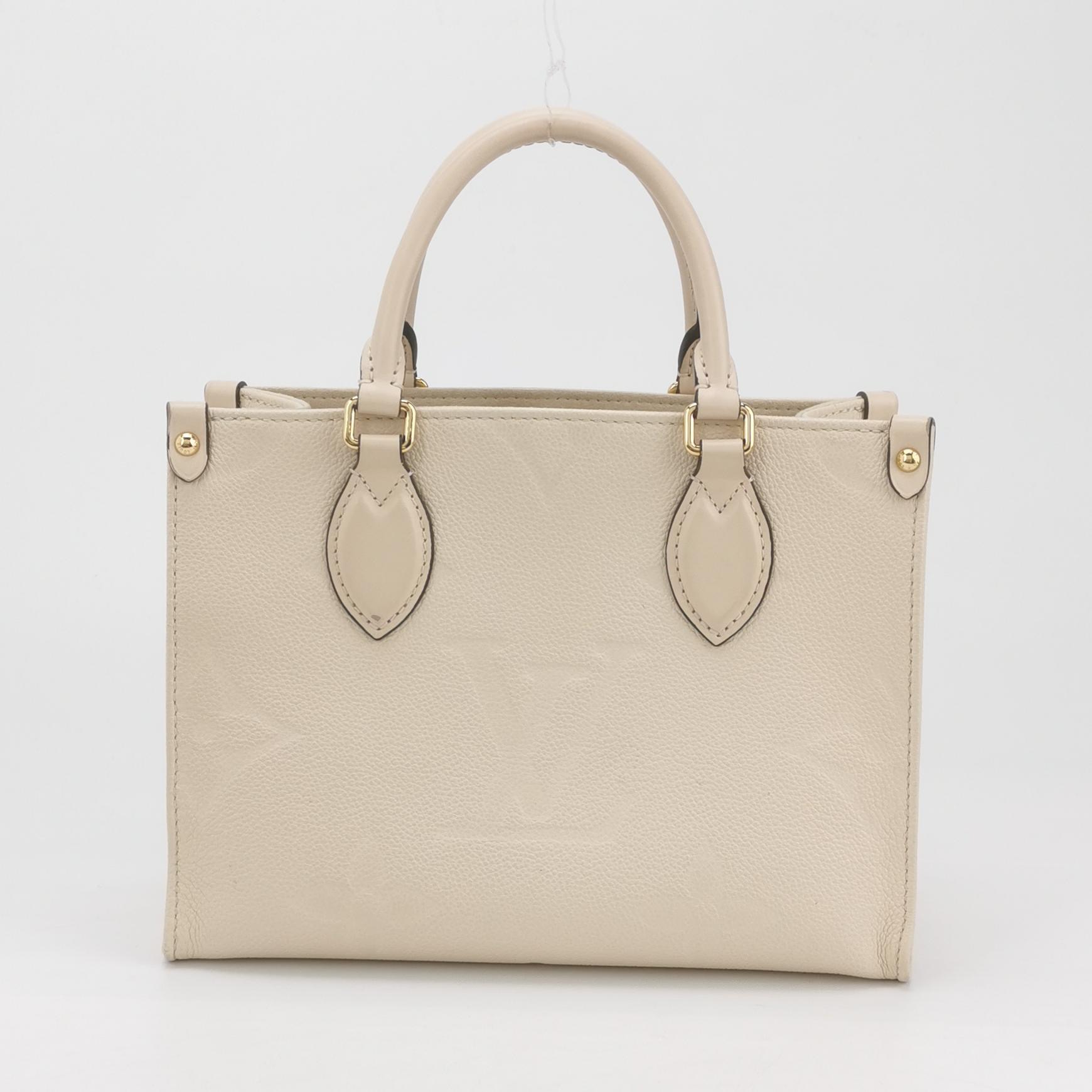 Louis Vuitton(LV) OnTheGo Tote Monogram Empreinte Giant PM — photo 3 of 15