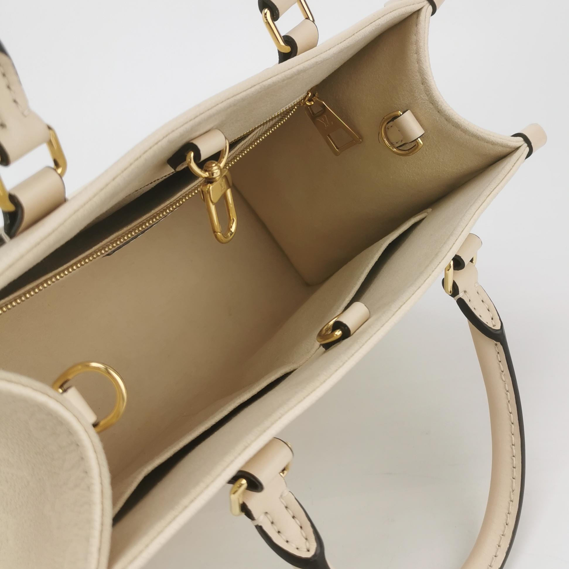 Louis Vuitton(LV) OnTheGo Tote Monogram Empreinte Giant PM — photo 7 of 15