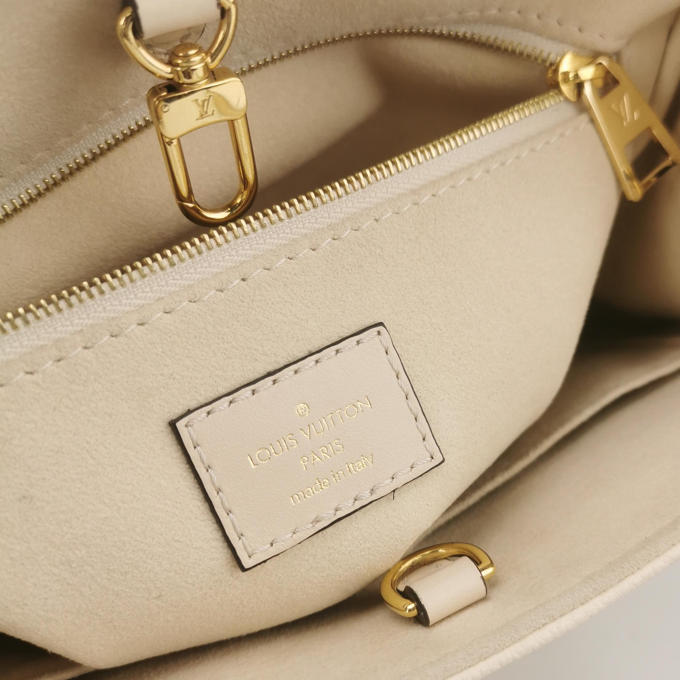 Louis Vuitton(LV) OnTheGo Tote Monogram Empreinte Giant PM — photo 8 of 15