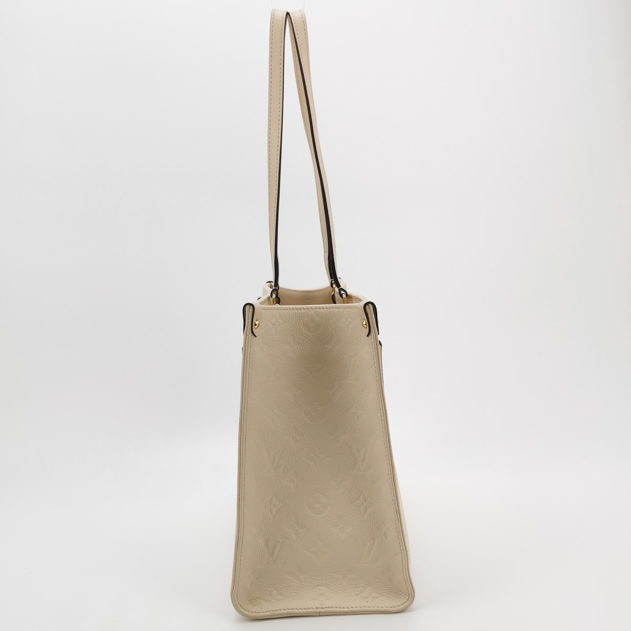 Louis Vuitton(LV) OnTheGo Tote Monogram Empreinte Giant MM — photo 4 of 15