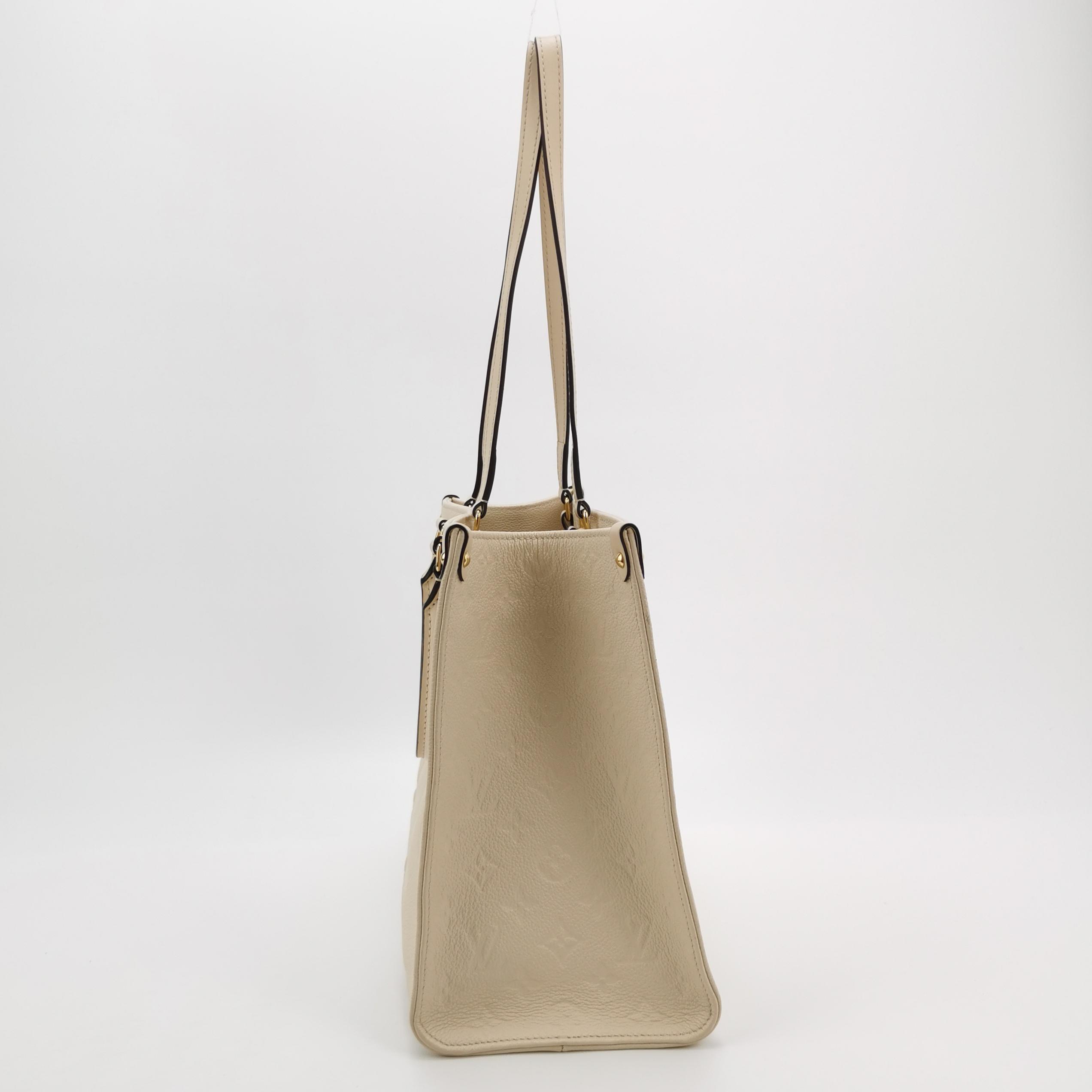 Louis Vuitton(LV) OnTheGo Tote Monogram Empreinte Giant MM — photo 5 of 15