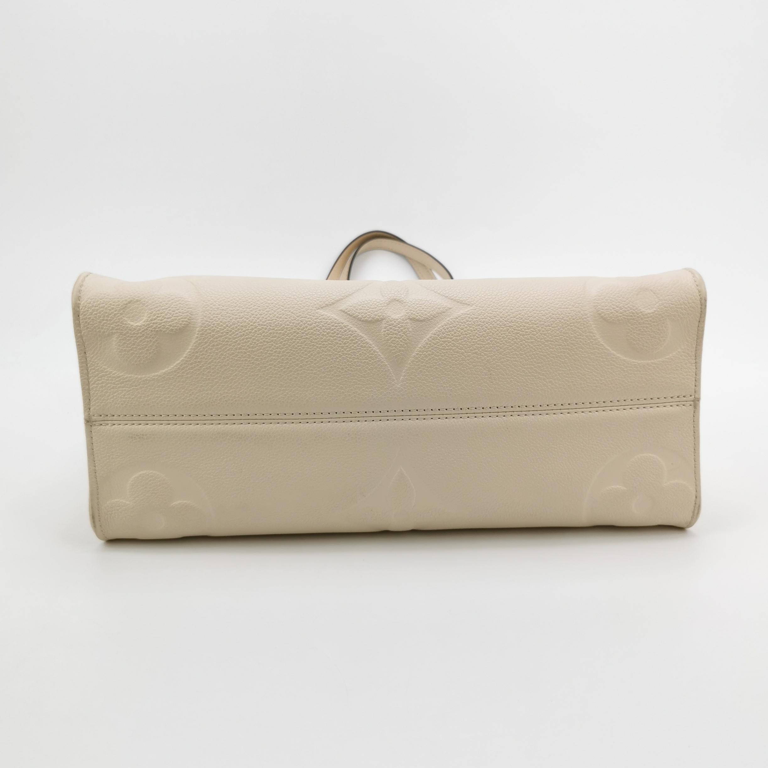 Louis Vuitton(LV) OnTheGo Tote Monogram Empreinte Giant MM — photo 6 of 15
