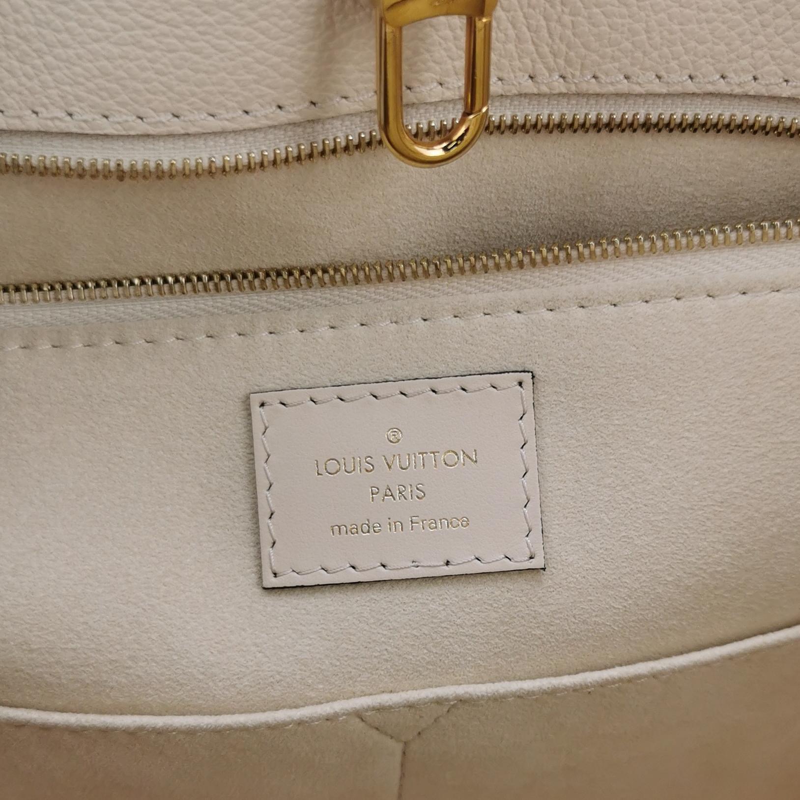 Louis Vuitton(LV) OnTheGo Tote Monogram Empreinte Giant MM — photo 8 of 15