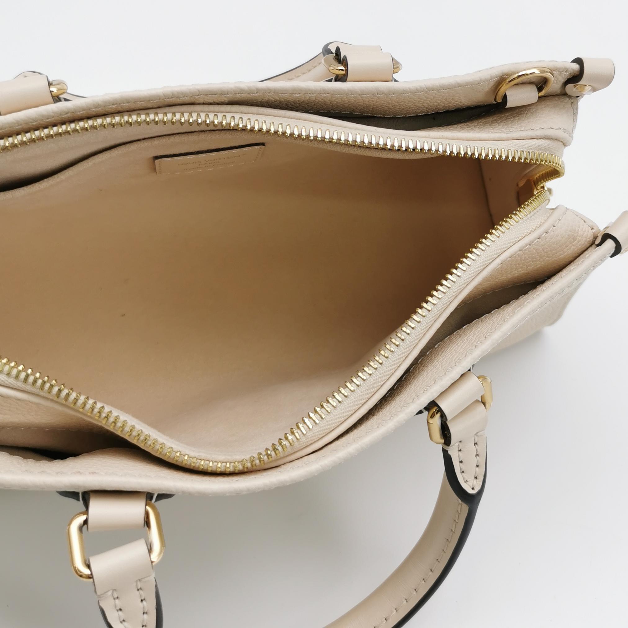 Louis Vuitton(LV) OnTheGo Tote Monogram Empreinte Giant East West — photo 7 of 13