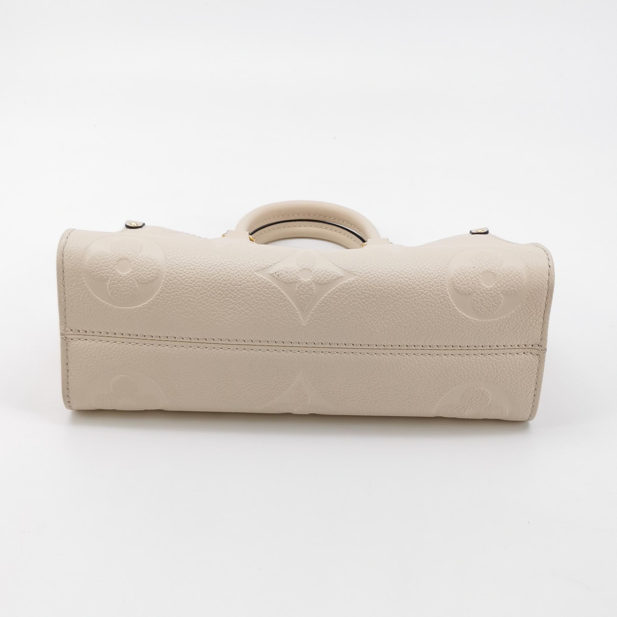 Louis Vuitton(LV) OnTheGo Tote Monogram Empreinte Giant East West — photo 6 of 17