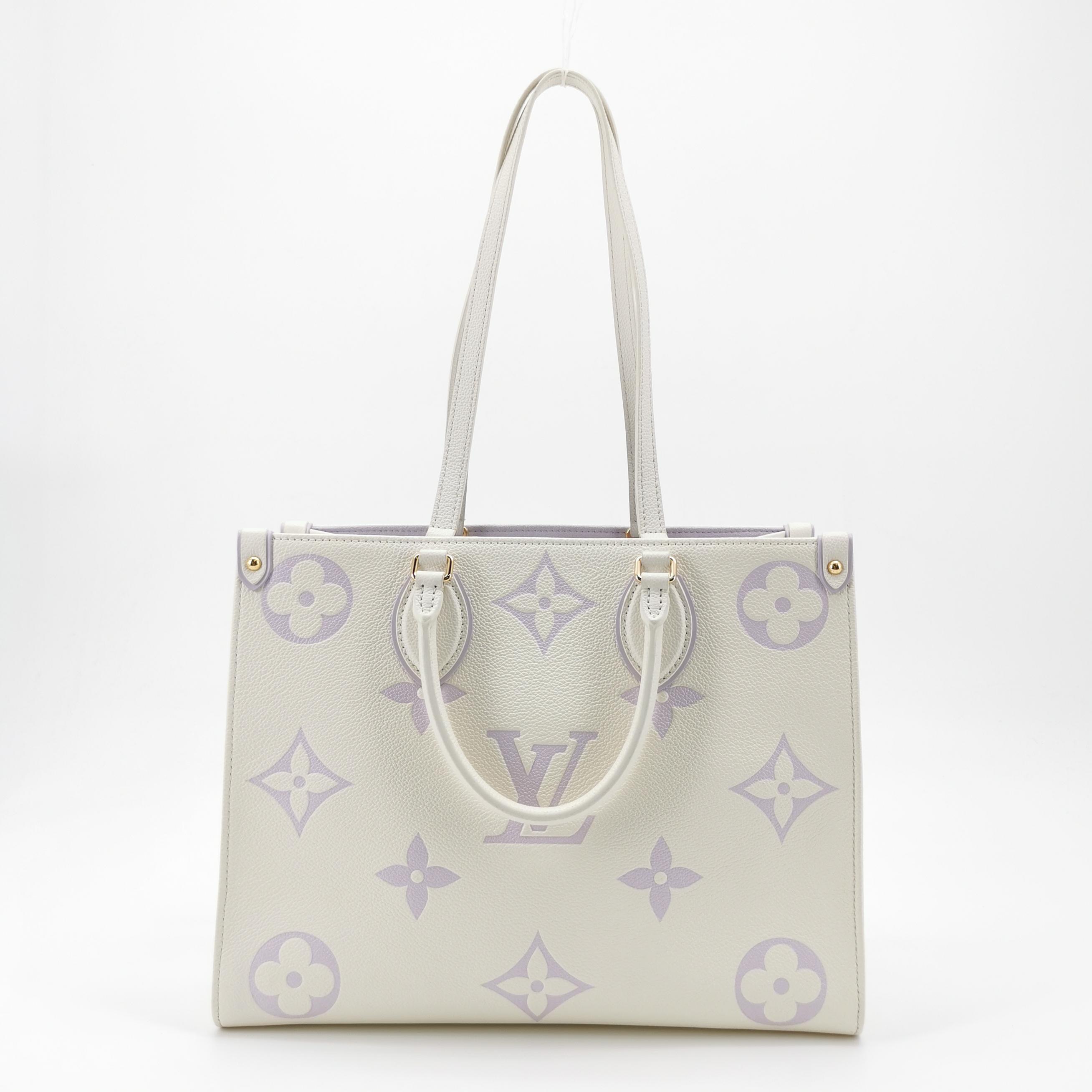 Louis Vuitton(LV) OnTheGo Tote Bicolor Monogram Empreinte Giant MM — photo 3 of 13