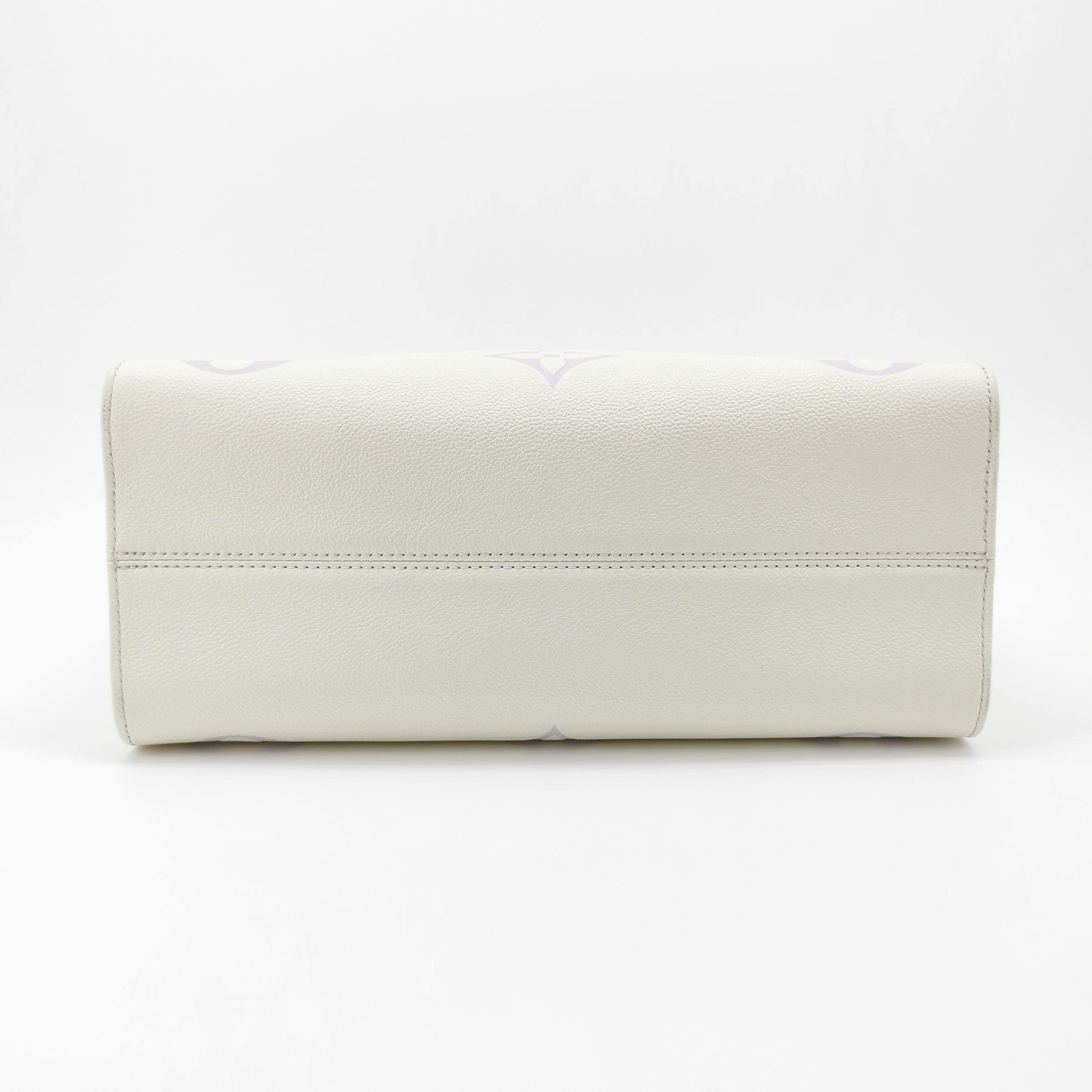 Louis Vuitton(LV) OnTheGo Tote Bicolor Monogram Empreinte Giant MM — photo 6 of 13