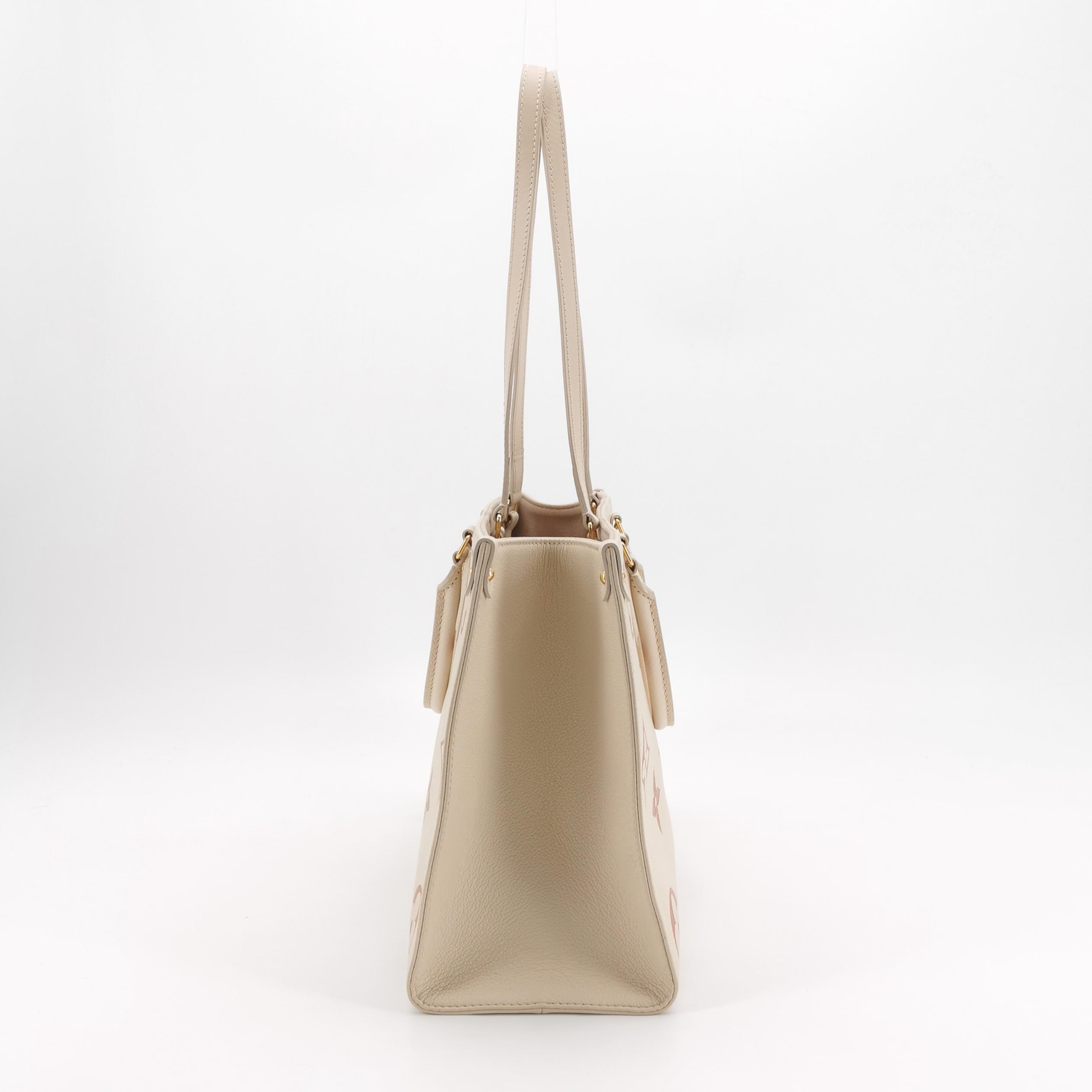 Louis Vuitton(LV) OnTheGo Tote Bicolor Monogram Empreinte Giant MM — photo 5 of 14