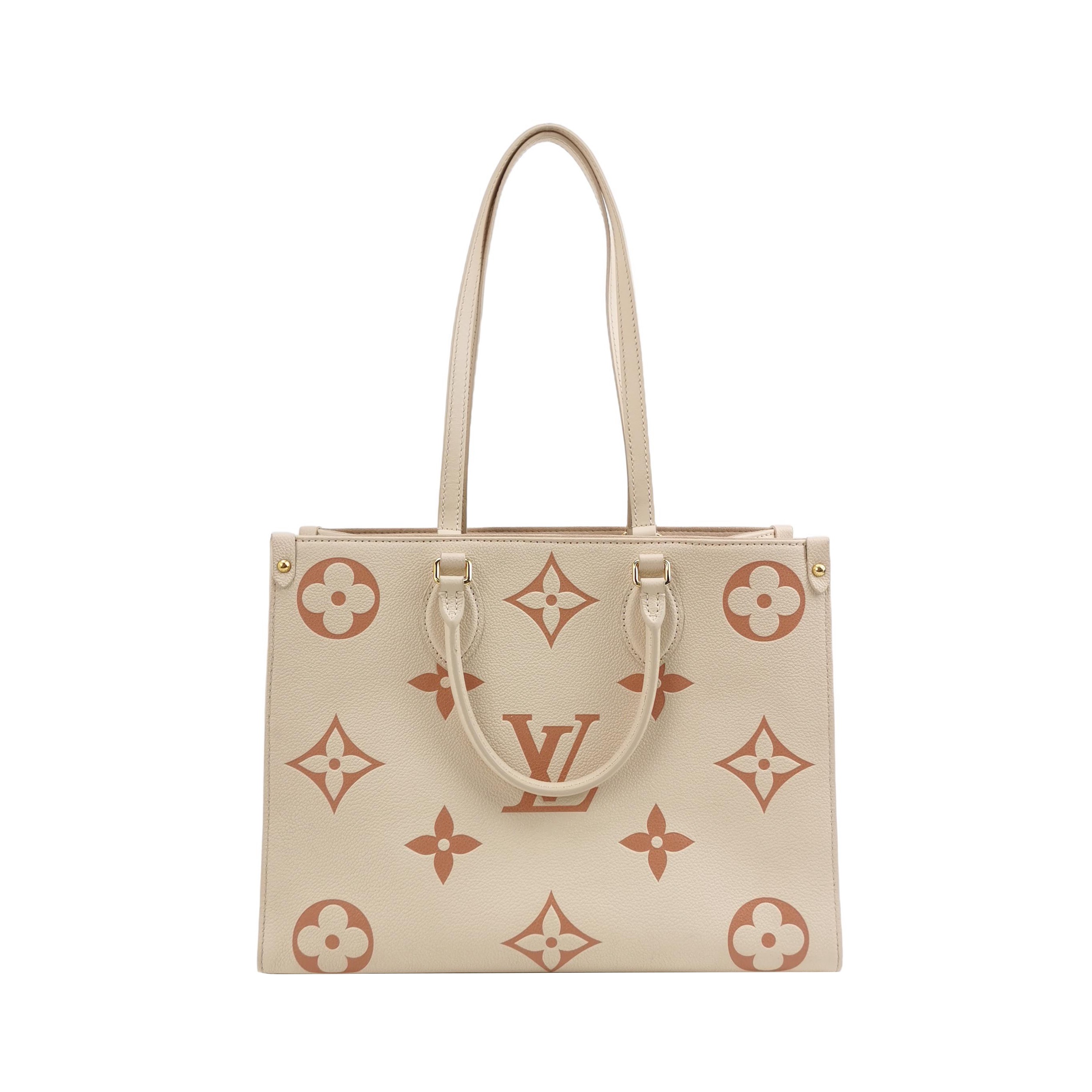 Louis Vuitton(LV) OnTheGo Tote Bicolor Monogram Empreinte Giant MM — photo 1 of 14