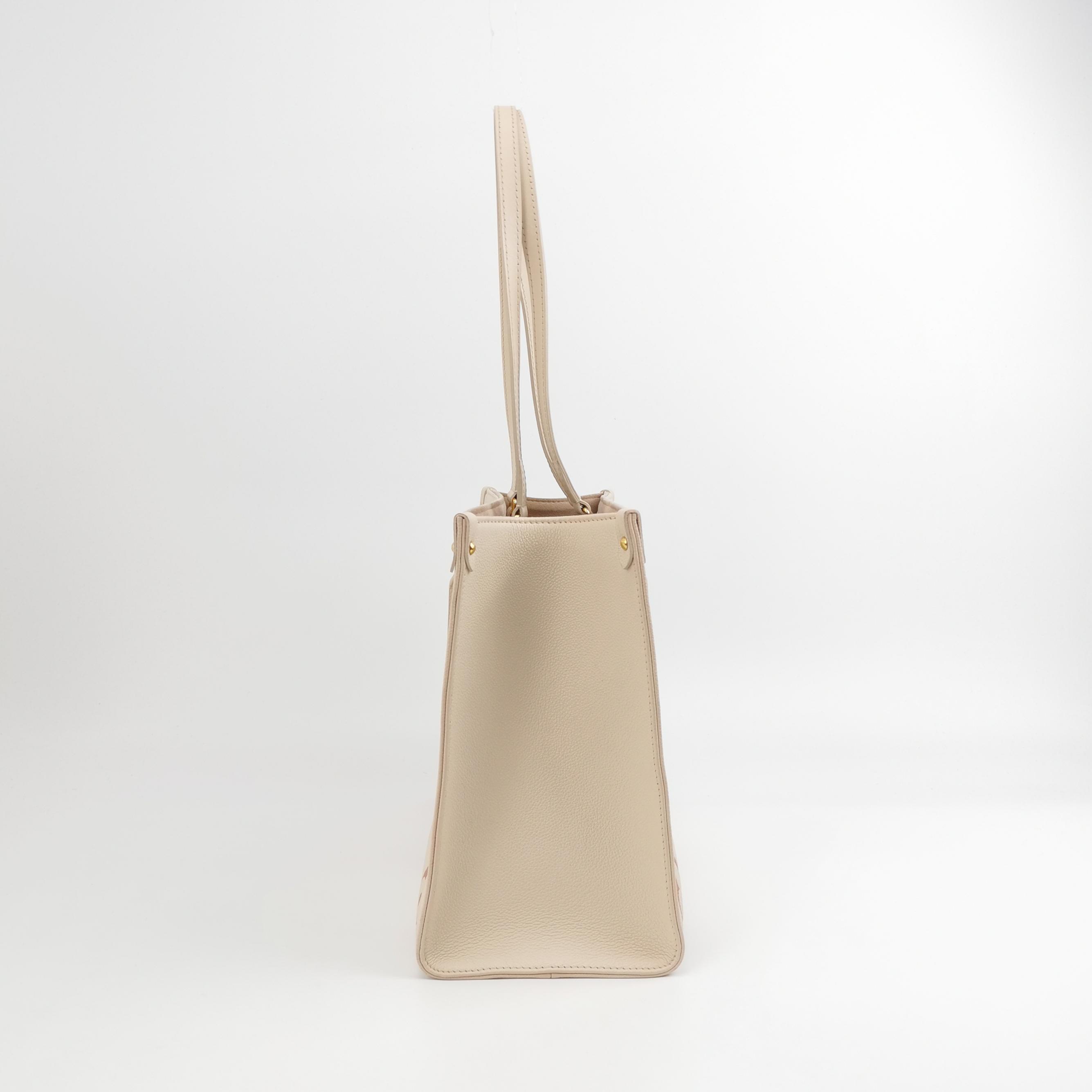 Louis Vuitton(LV) OnTheGo Tote Bicolor Monogram Empreinte Giant MM — photo 5 of 14