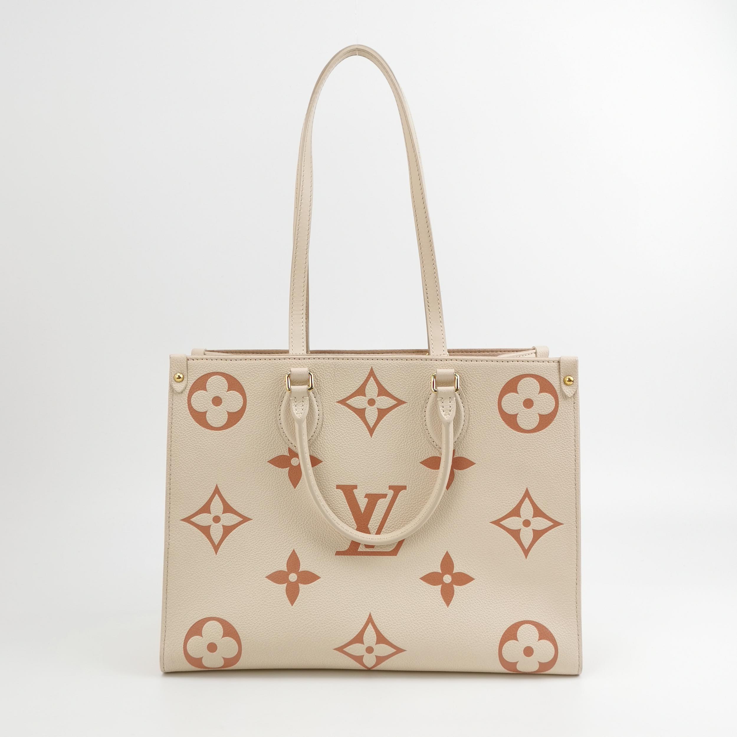 Louis Vuitton(LV) OnTheGo Tote Bicolor Monogram Empreinte Giant MM — photo 3 of 14