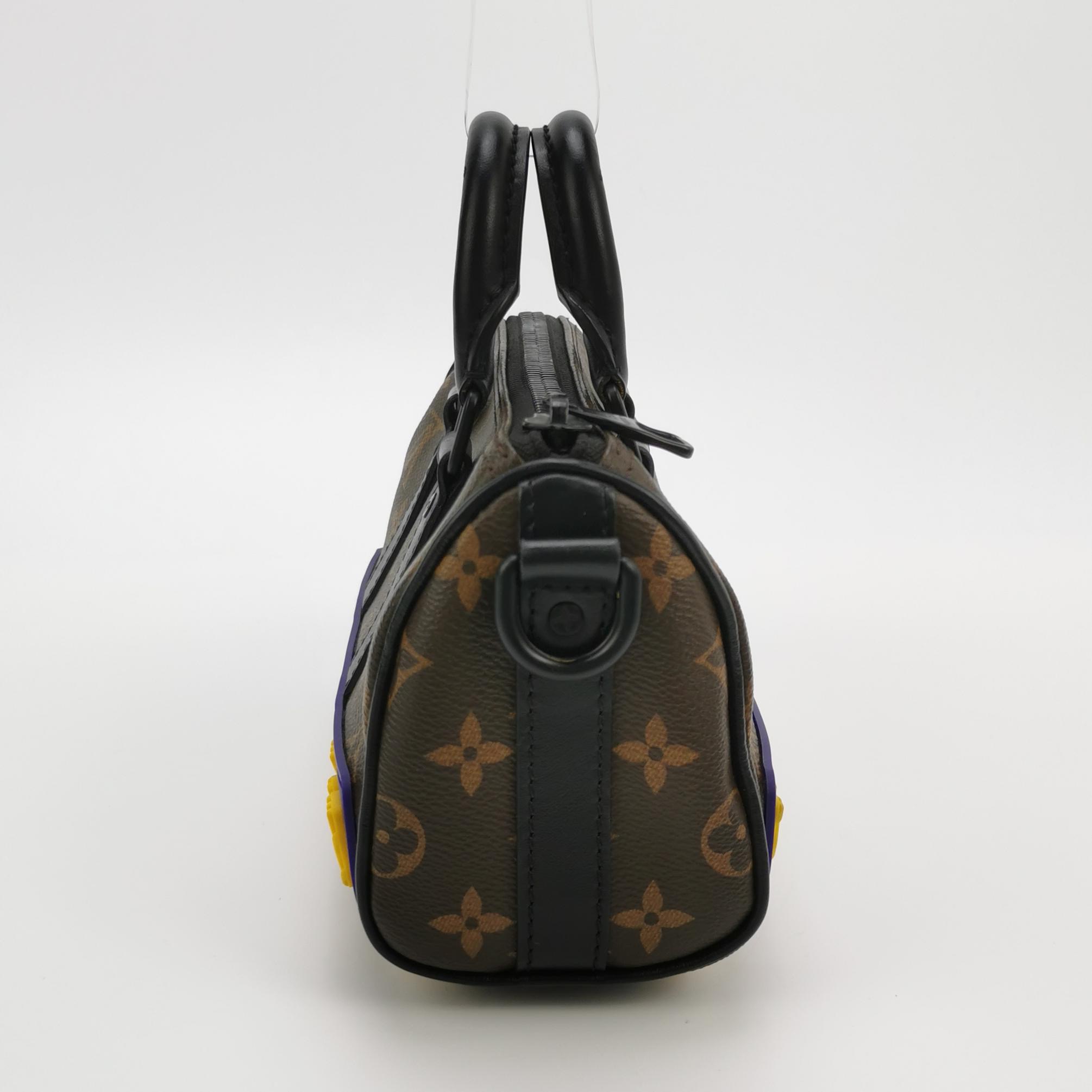Louis Vuitton(LV) Monogram rubber Keepall XS — photo 4 of 13