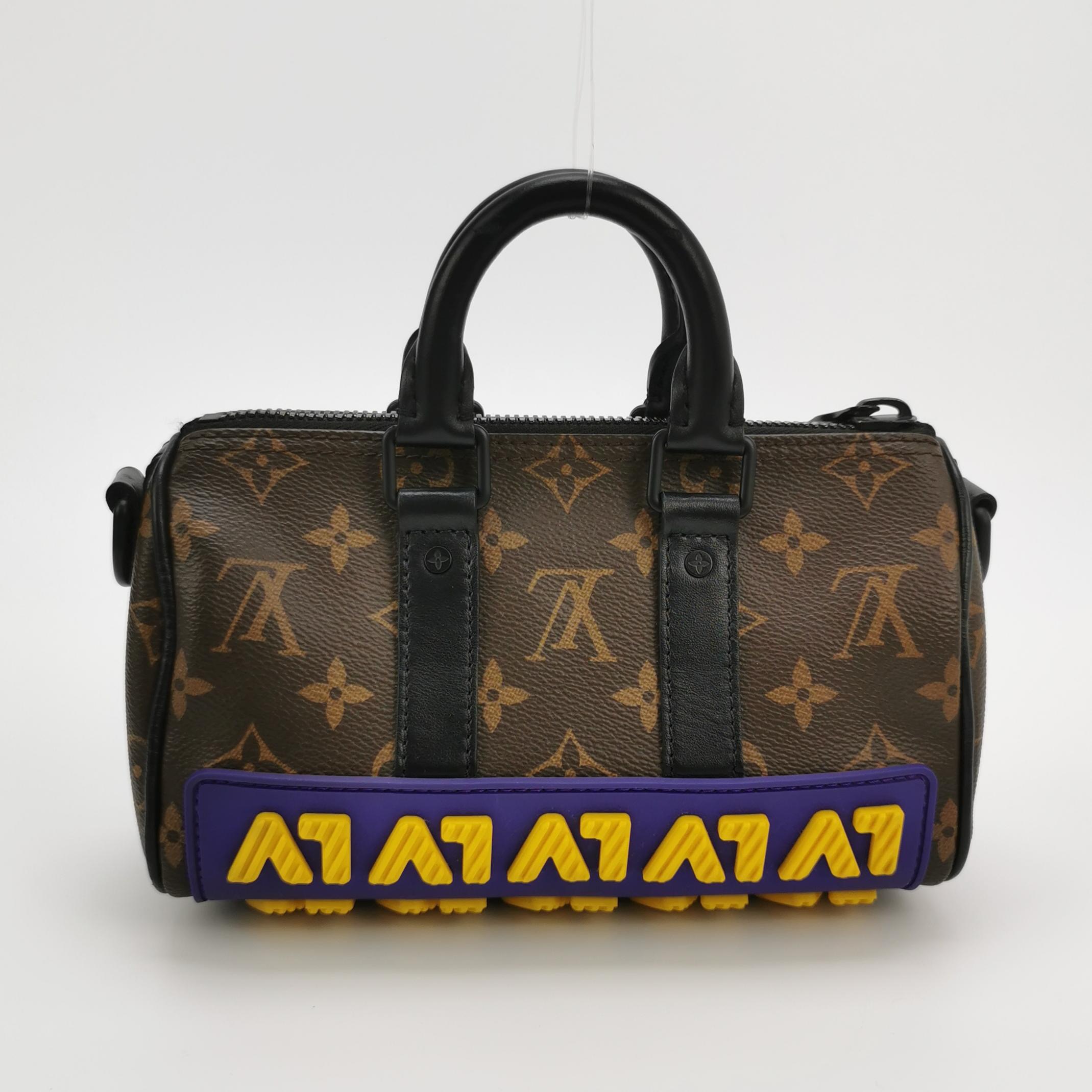 Louis Vuitton(LV) Monogram rubber Keepall XS — photo 5 of 13