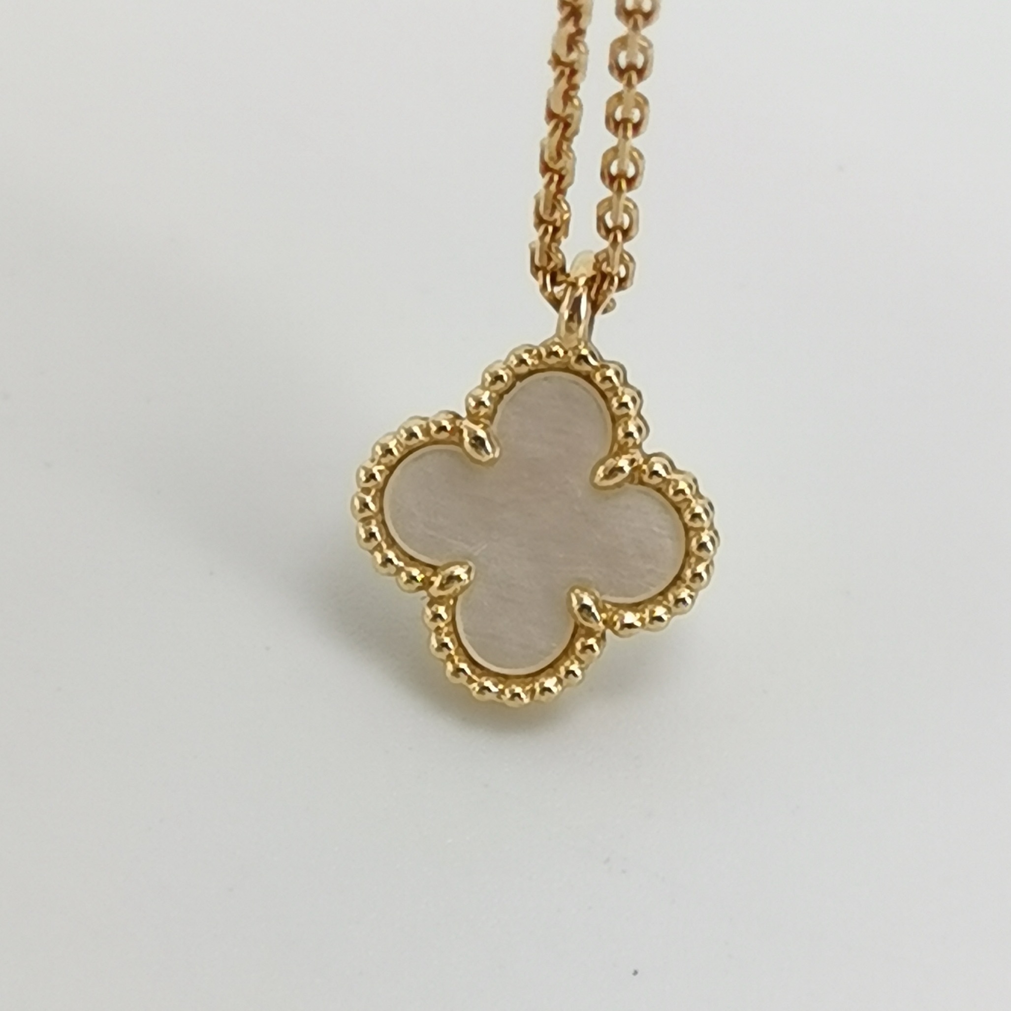 Van Cleef & Arpels Sweet Alhambra Pendant Necklace 18K Yellow Gold and Mother of Pearl — photo 8 of 8