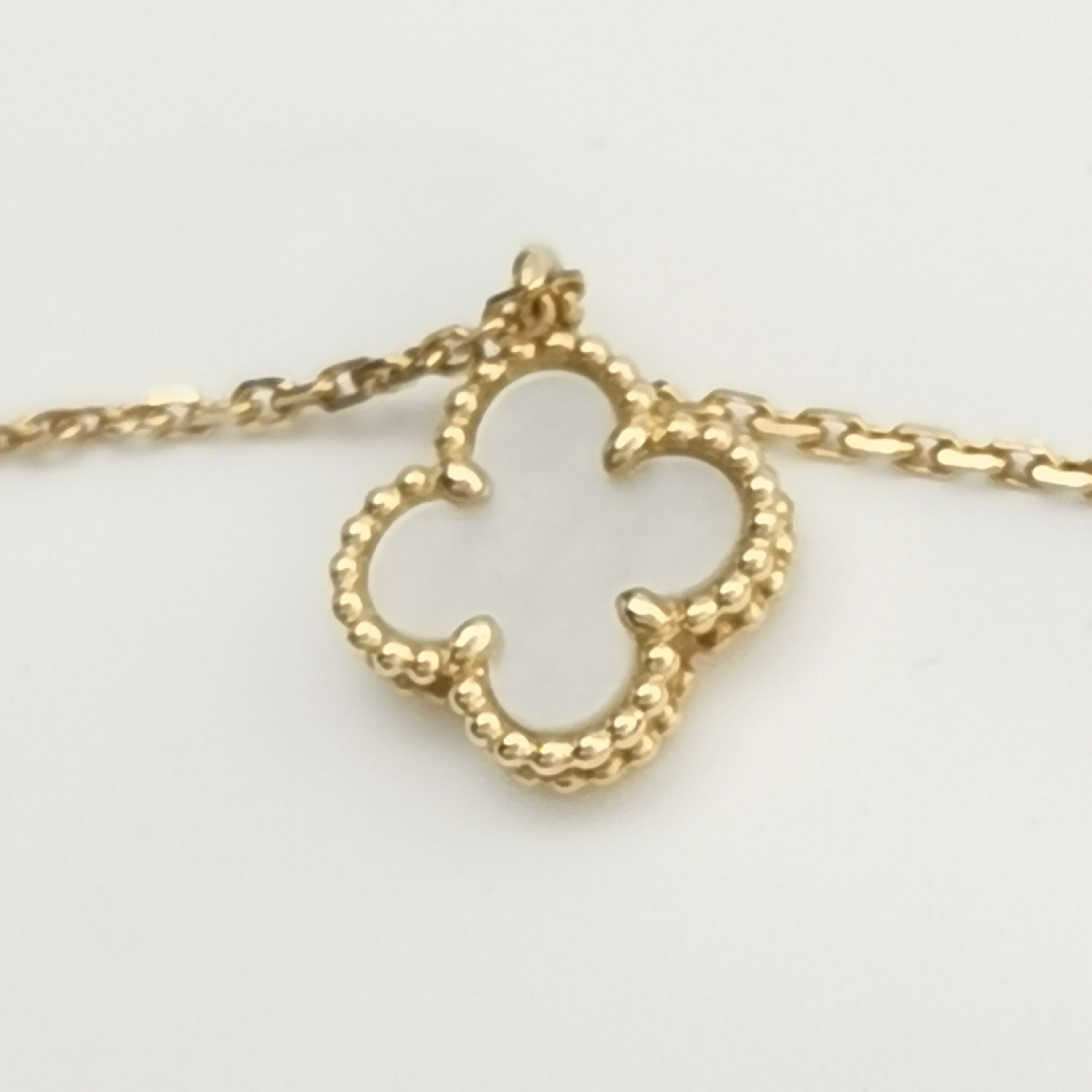 Van Cleef & Arpels Sweet Alhambra Pendant Necklace 18K Yellow Gold and Mother of Pearl — photo 7 of 8