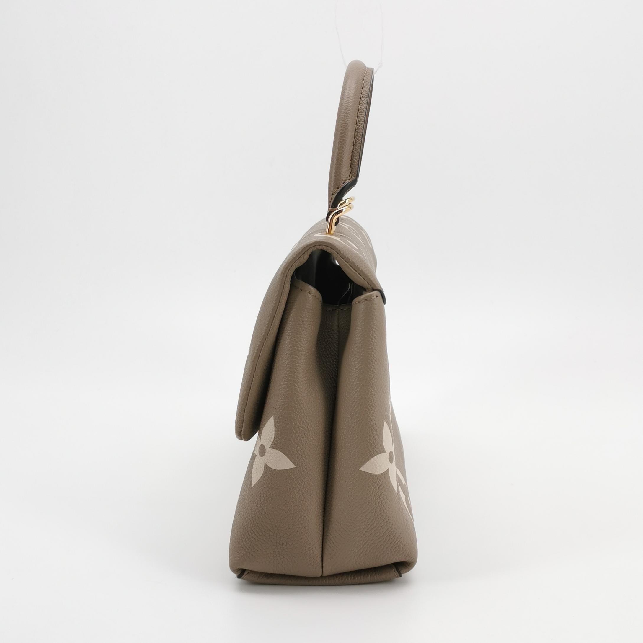 Louis Vuitton(LV) Madeleine Handbag Bicolor Monogram Empreinte Giant MM — photo 4 of 23
