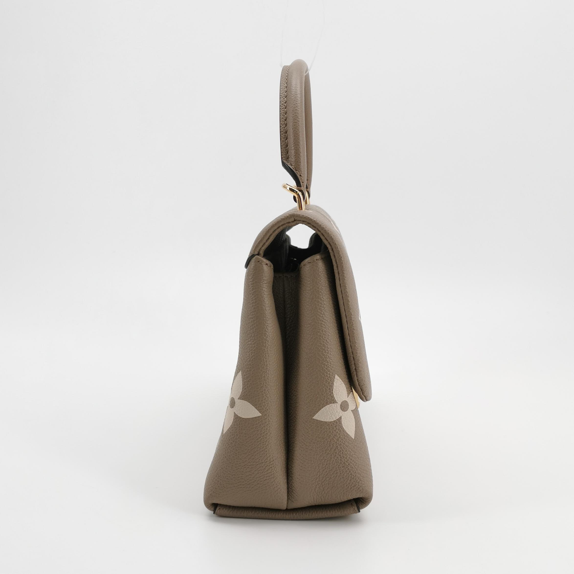 Louis Vuitton(LV) Madeleine Handbag Bicolor Monogram Empreinte Giant MM — photo 3 of 23