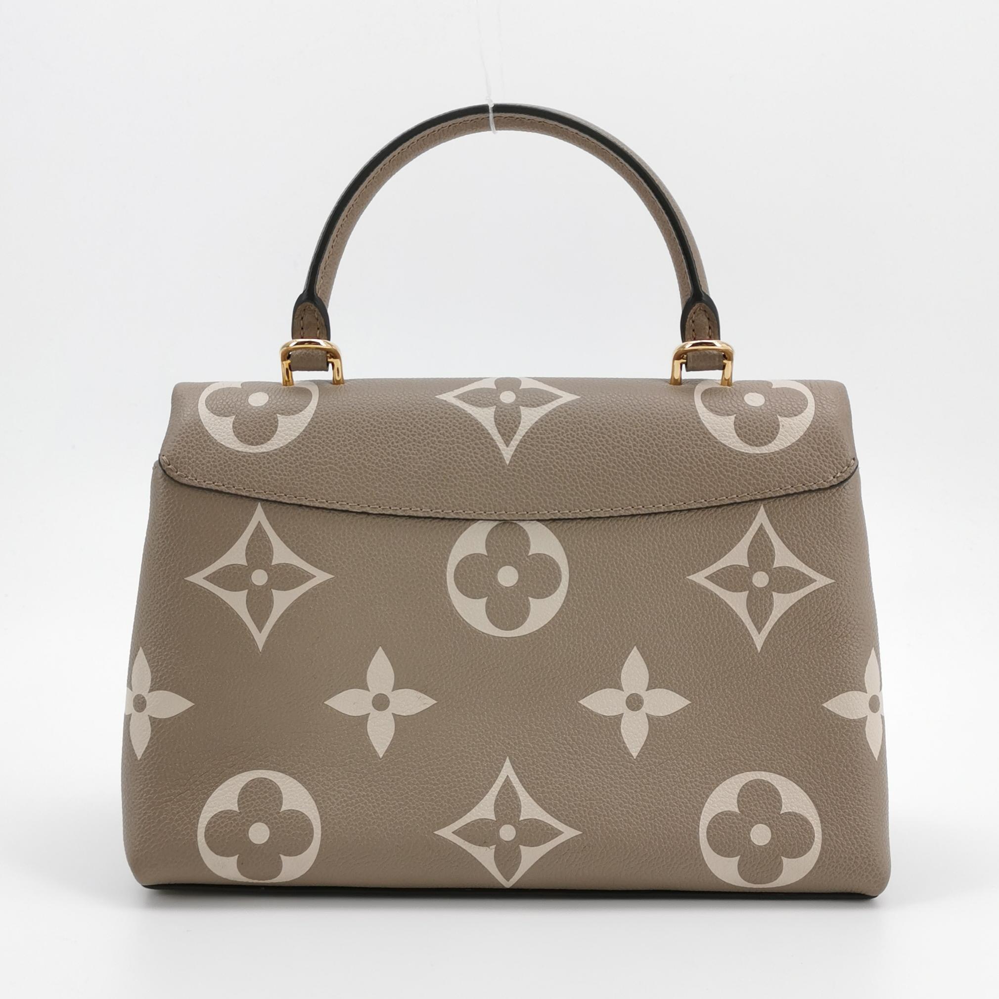 Louis Vuitton(LV) Madeleine Handbag Bicolor Monogram Empreinte Giant MM — photo 5 of 23