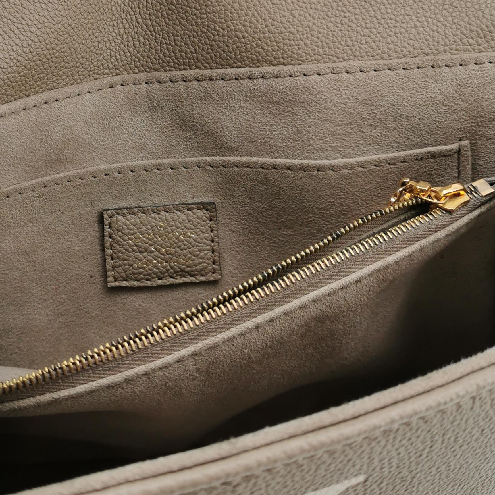 Louis Vuitton(LV) Madeleine Handbag Bicolor Monogram Empreinte Giant MM — photo 9 of 23