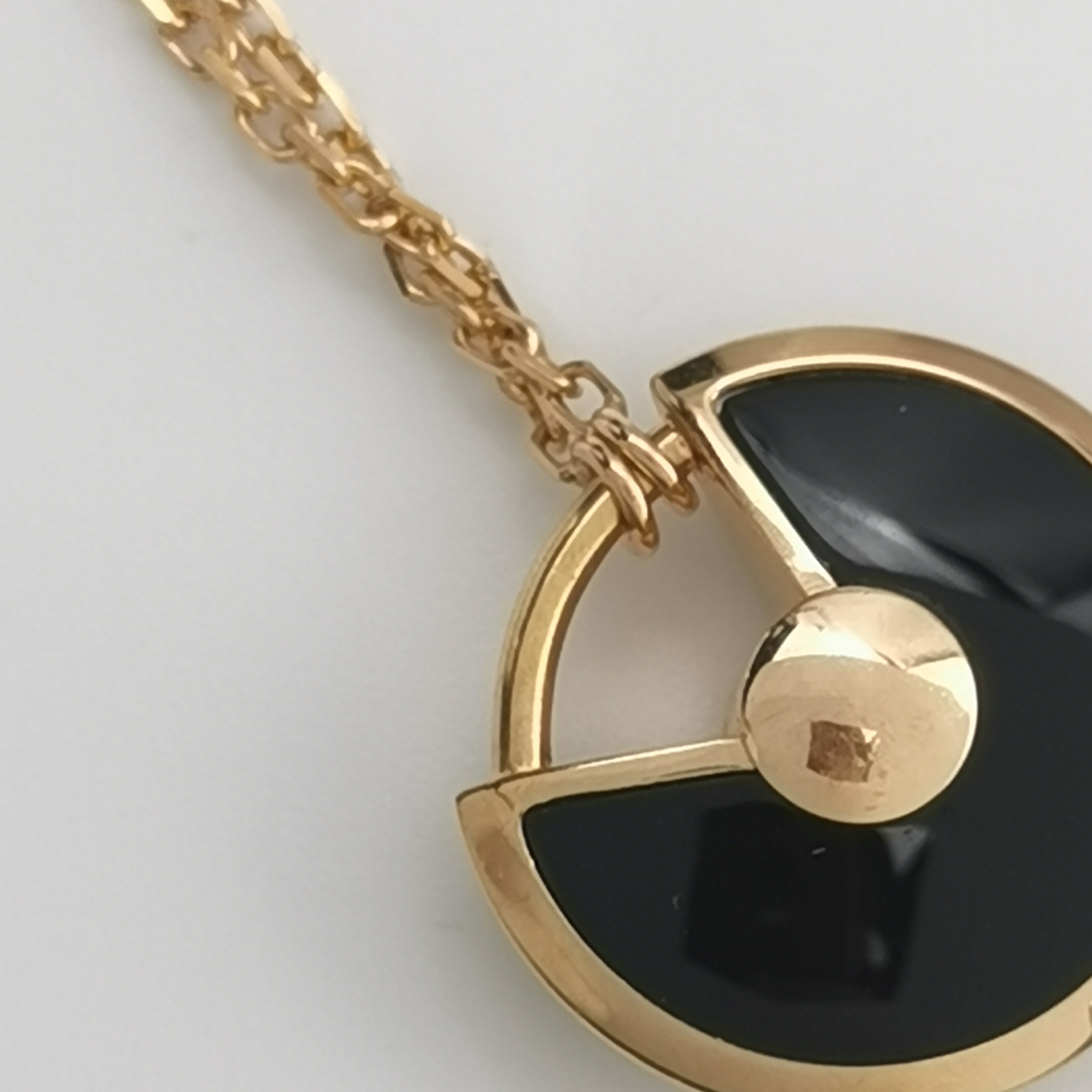 Cartier Amulette de Cartier Pendant Necklace 18K Rose Gold with Onyx and Diamond XS — photo 6 of 6