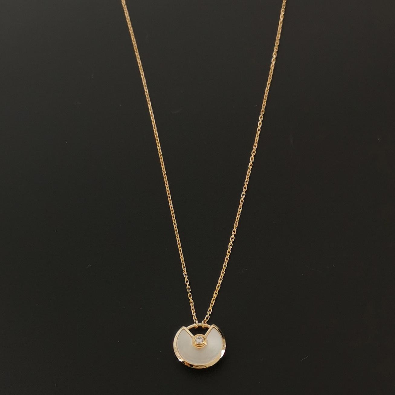 Cartier Amulette de Cartier Pendant Necklace 18K Yellow Gold with Mother of Pearl and Diamond XS — photo 4 of 7