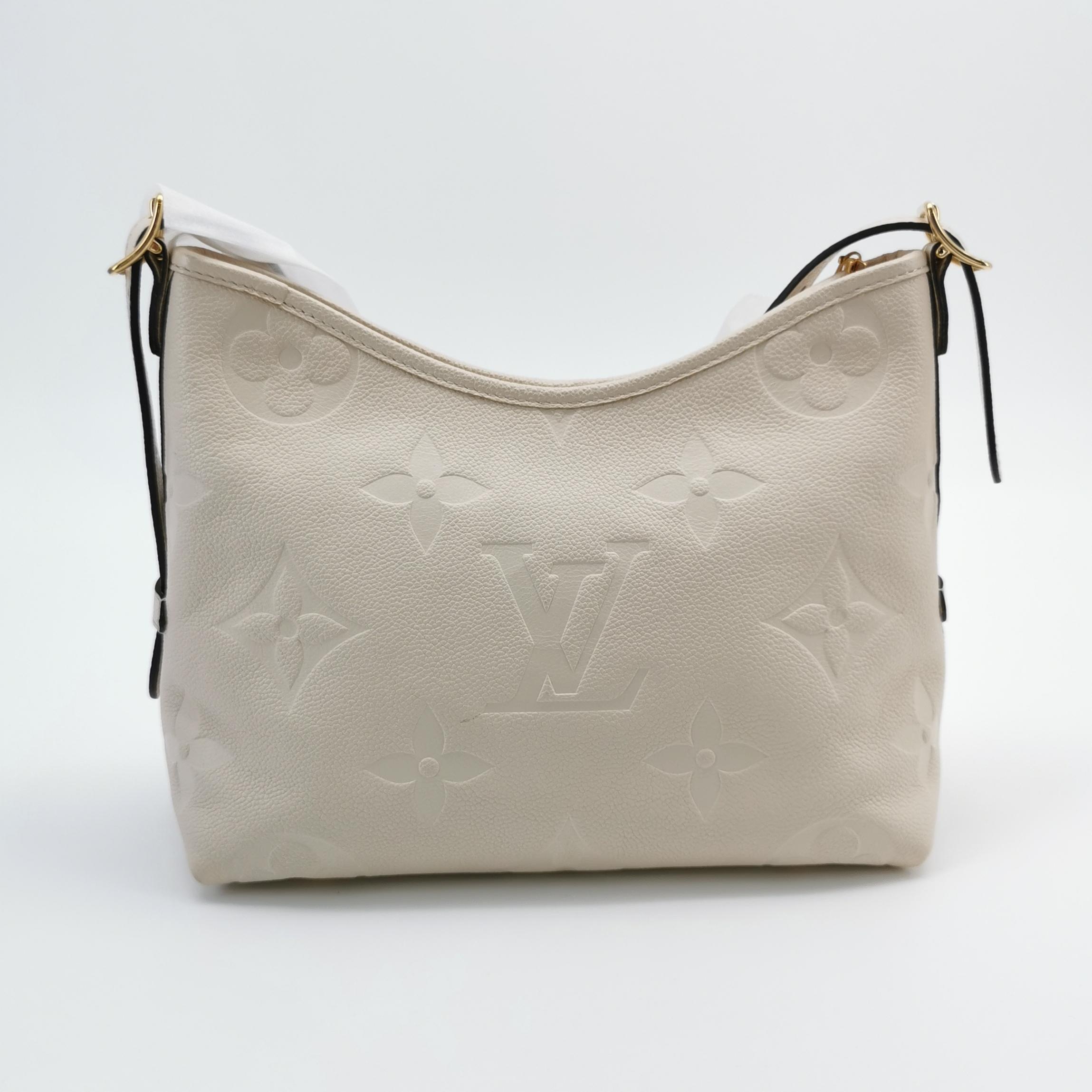 Louis Vuitton(LV) CarryAll Hobo Monogram Empreinte Giant PM — photo 6 of 24