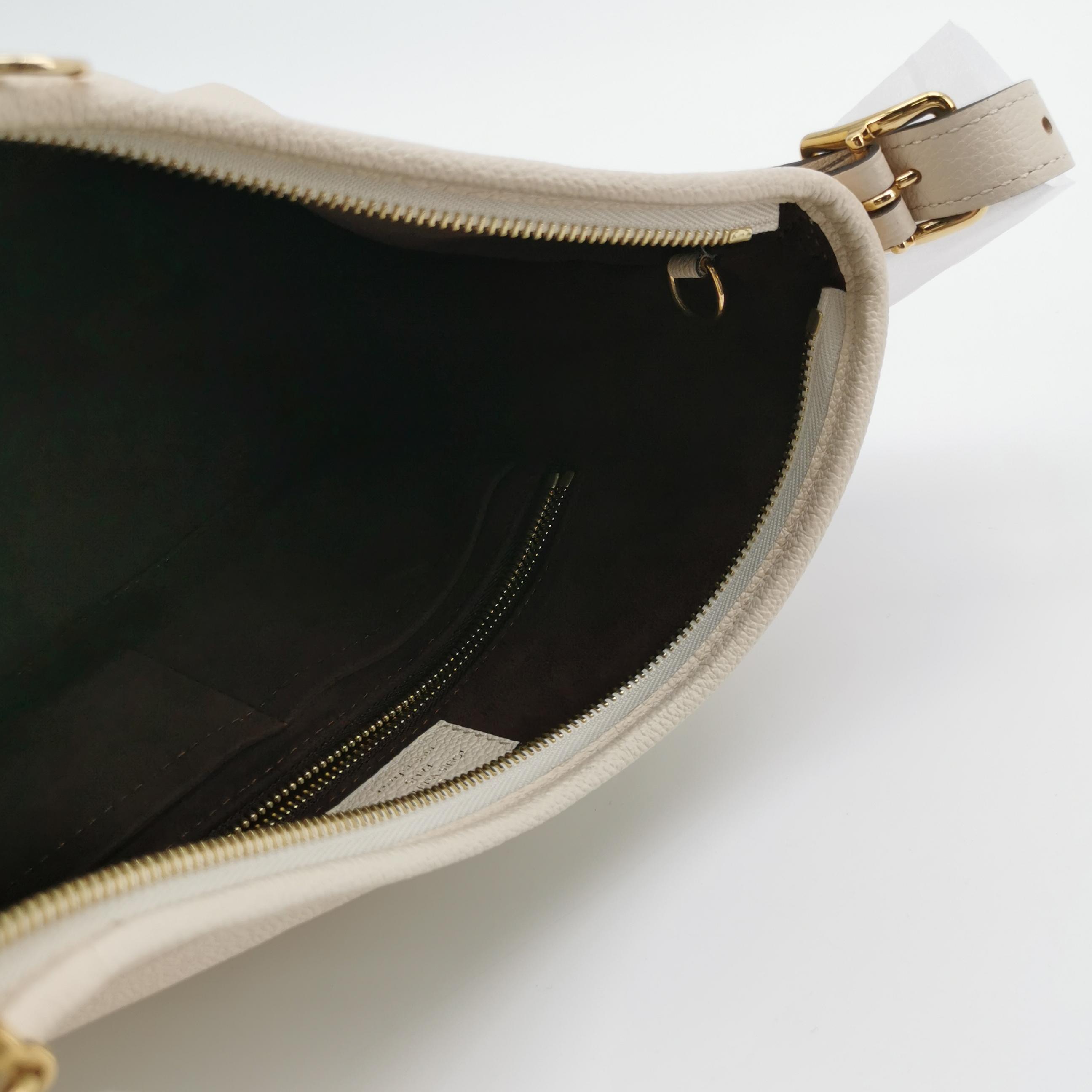 Louis Vuitton(LV) CarryAll Hobo Monogram Empreinte Giant PM — photo 8 of 24