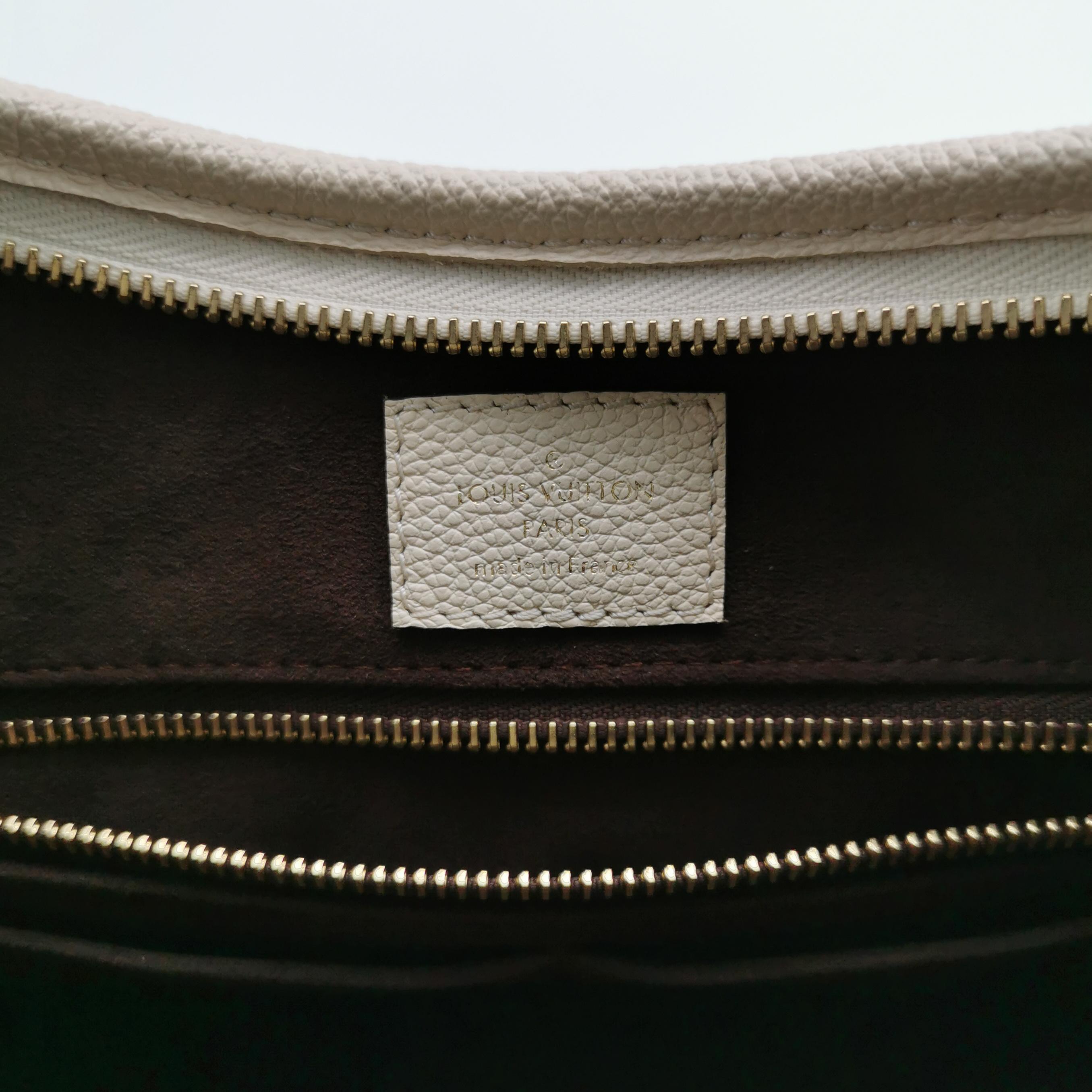 Louis Vuitton(LV) CarryAll Hobo Monogram Empreinte Giant PM — photo 9 of 24