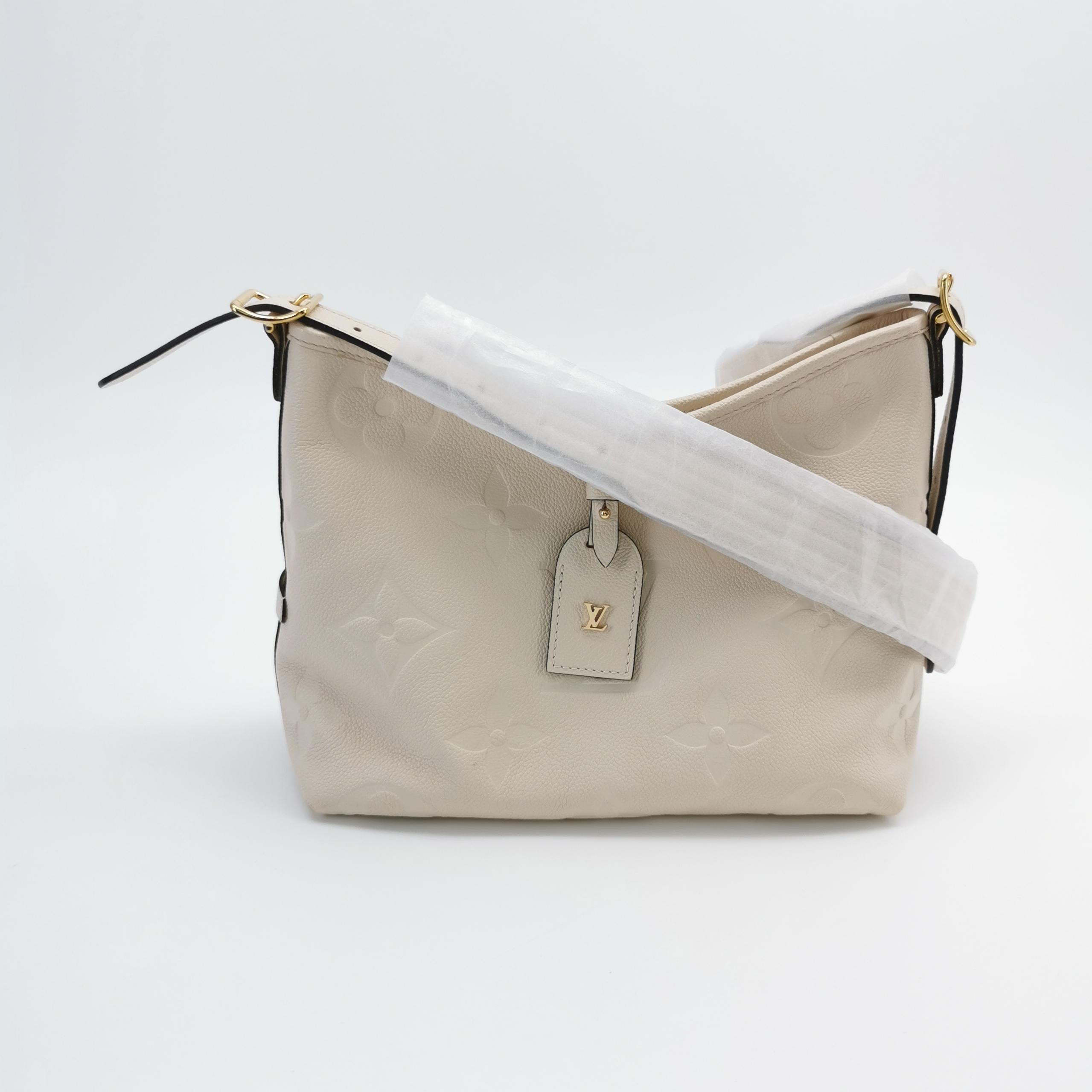 Louis Vuitton(LV) CarryAll Hobo Monogram Empreinte Giant PM — photo 5 of 24