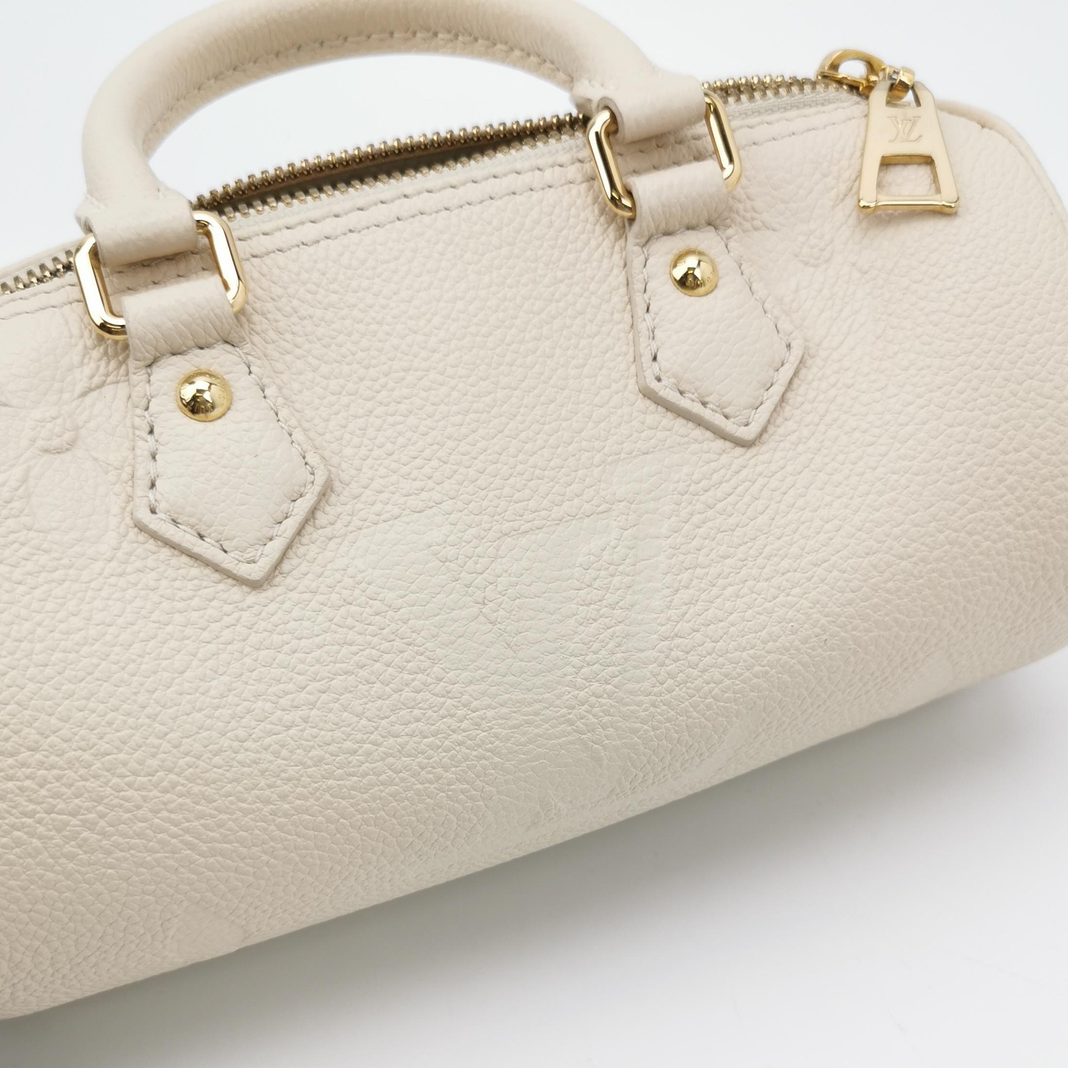 Louis Vuitton(LV) Papillon Handbag Bicolor Monogram Empreinte Giant BB — photo 7 of 12