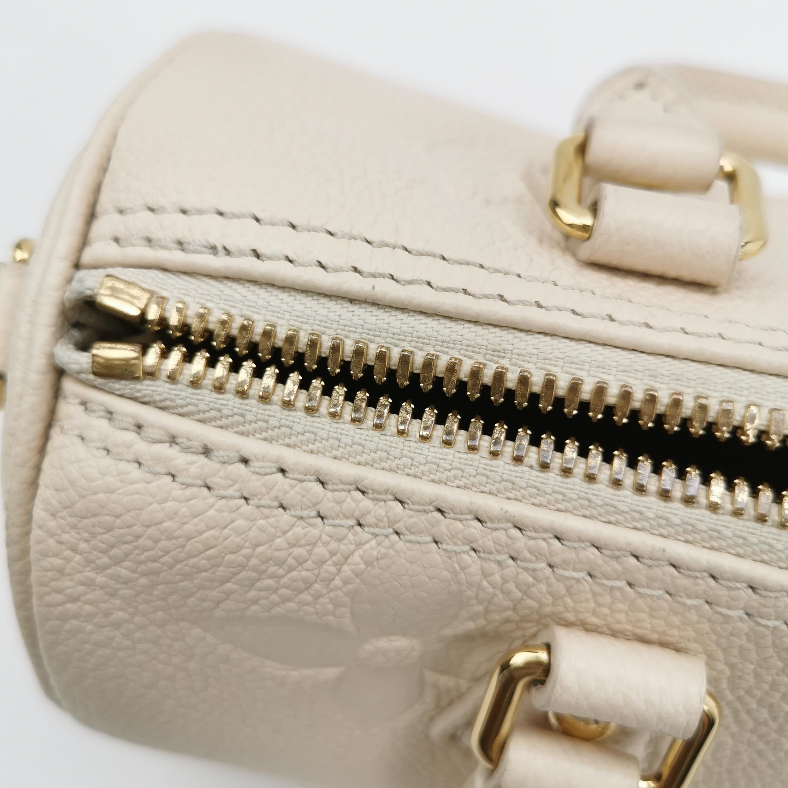 Louis Vuitton(LV) Papillon Handbag Bicolor Monogram Empreinte Giant BB — photo 9 of 12