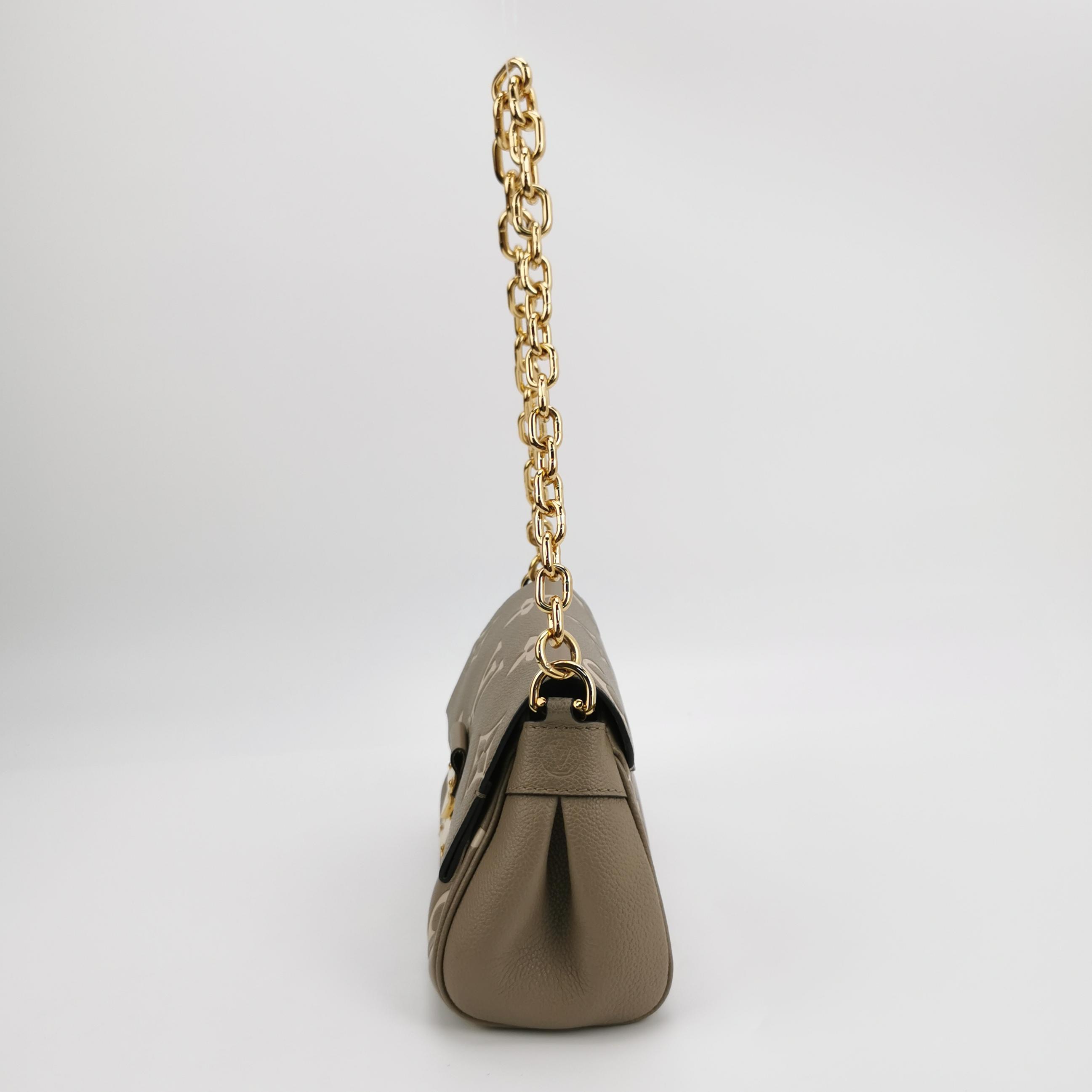 Louis Vuitton(LV) Favorite NM Handbag Bicolor Monogram Empreinte Giant — photo 3 of 16