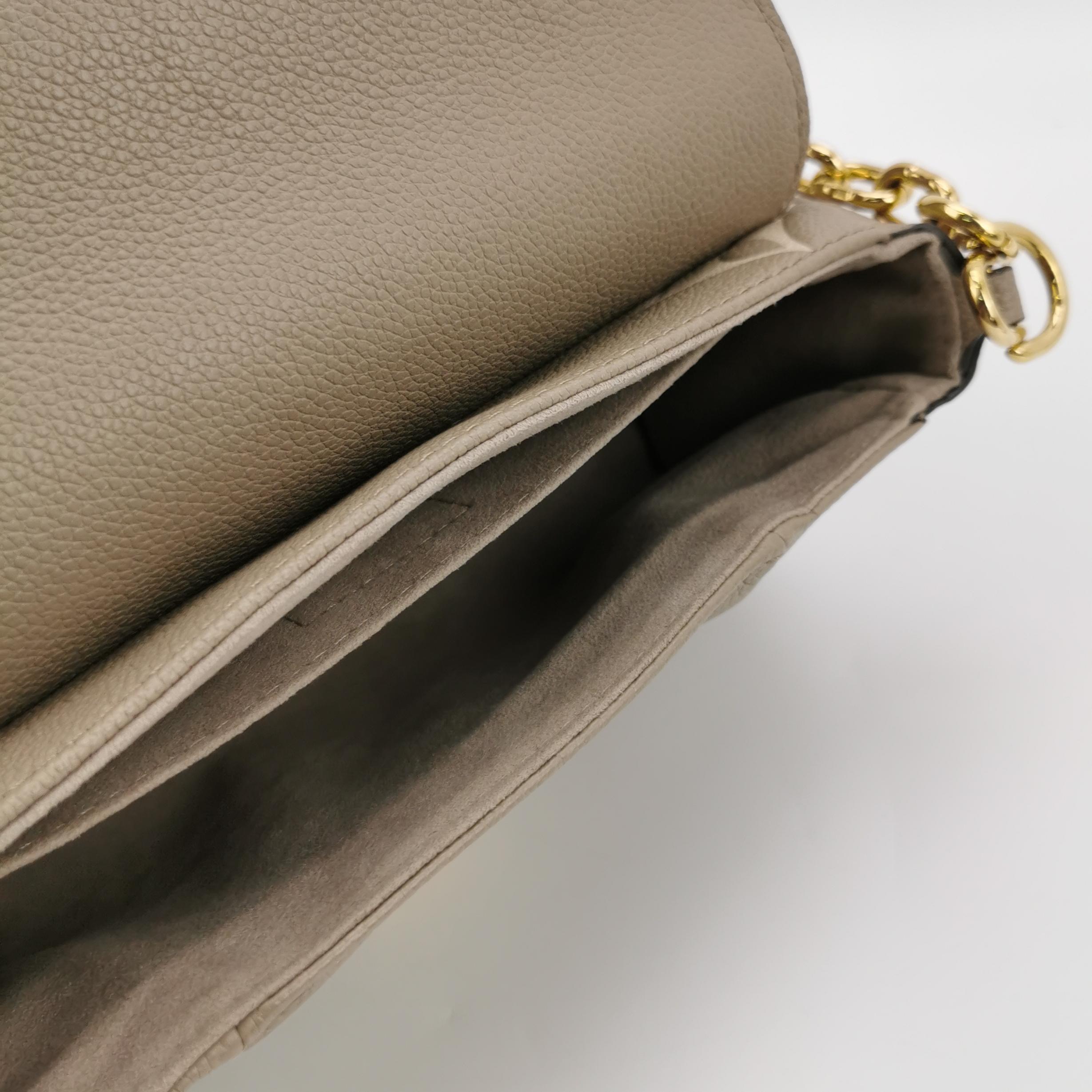 Louis Vuitton(LV) Favorite NM Handbag Bicolor Monogram Empreinte Giant — photo 8 of 16