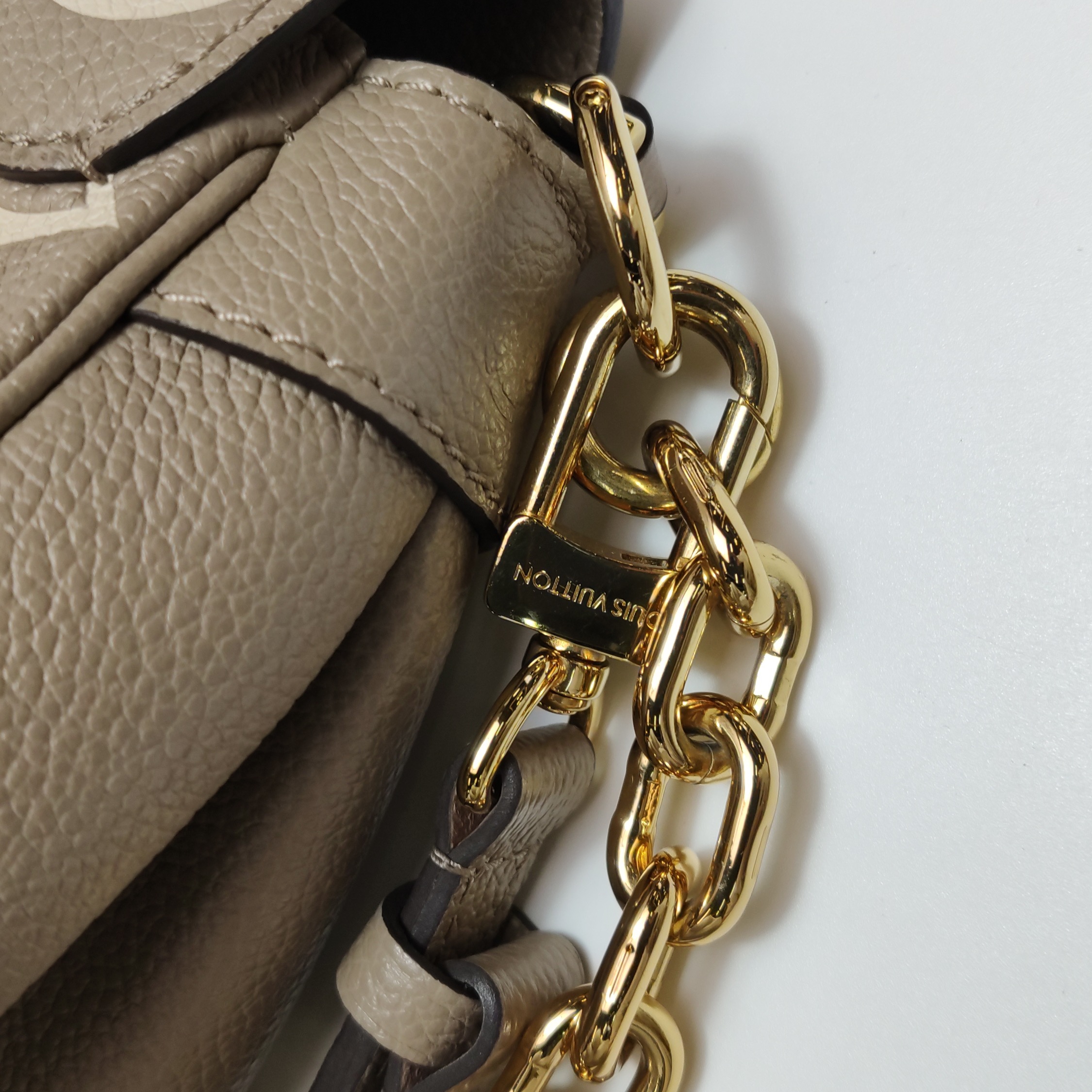 Louis Vuitton(LV) Favorite NM Handbag Bicolor Monogram Empreinte Giant — photo 14 of 16