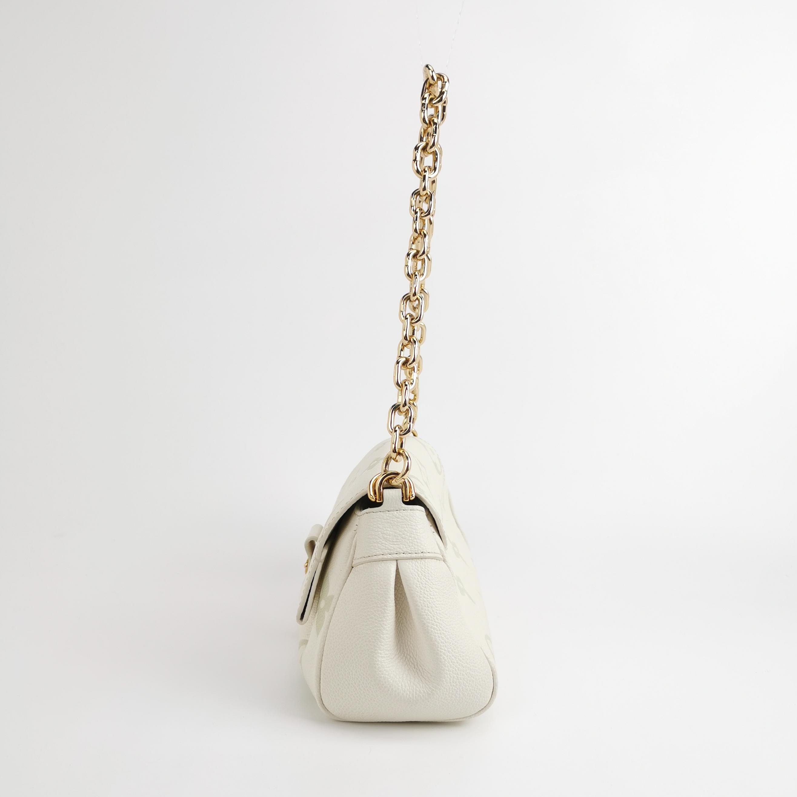 Louis Vuitton(LV) Favorite NM Handbag Bicolor Monogram Empreinte — photo 3 of 15