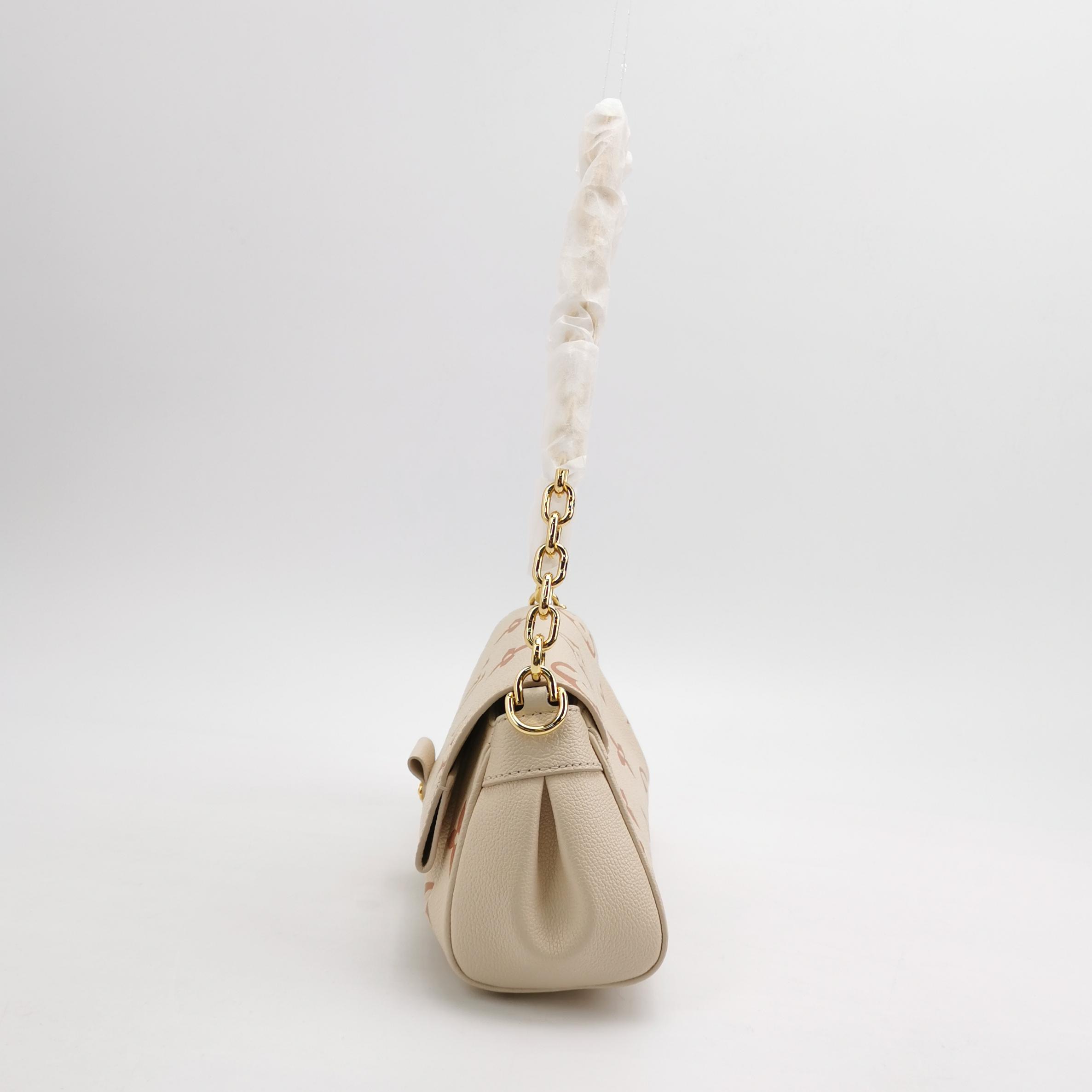 Louis Vuitton(LV) Favorite NM Handbag Bicolor Monogram Empreinte Giant — photo 4 of 11