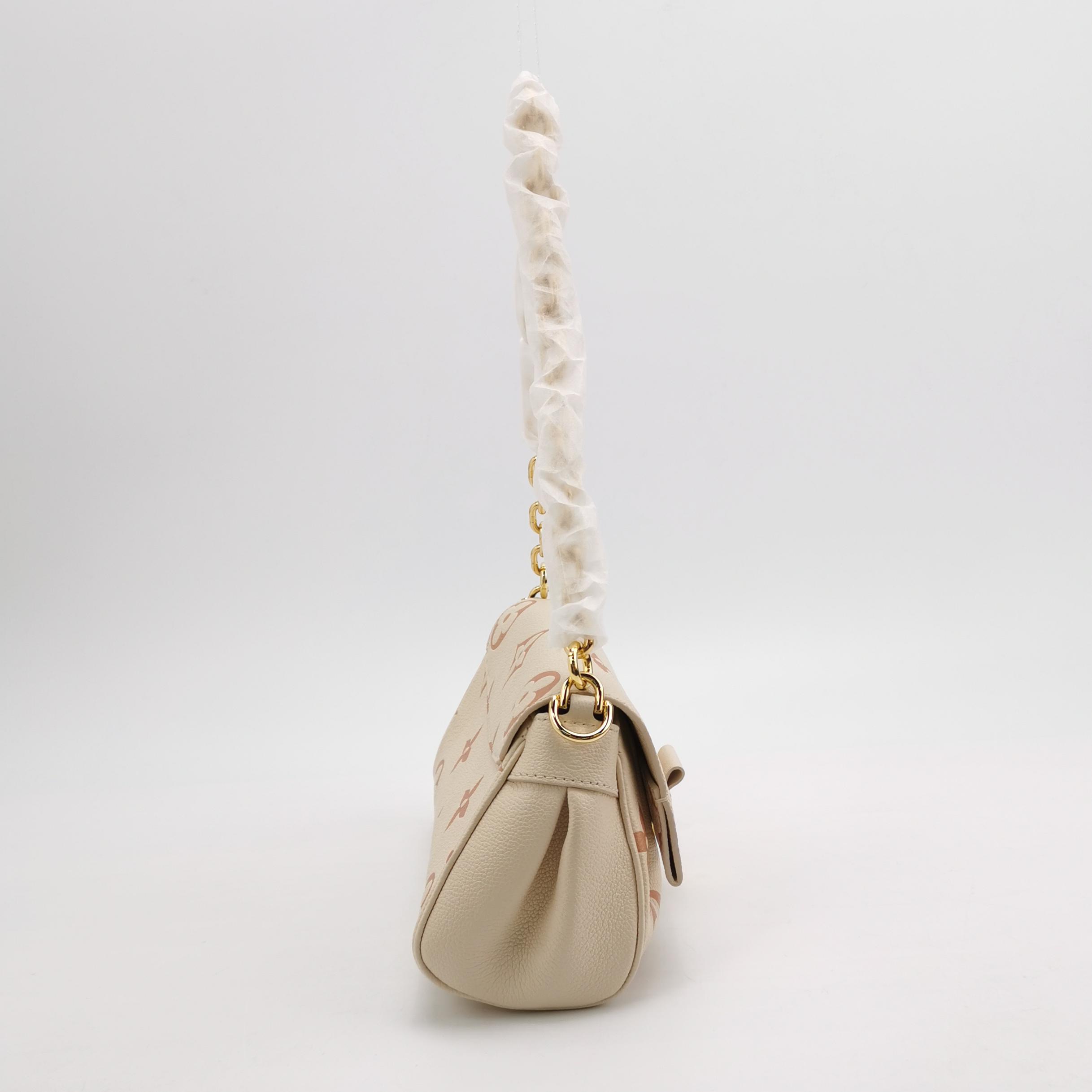 Louis Vuitton(LV) Favorite NM Handbag Bicolor Monogram Empreinte Giant — photo 3 of 11