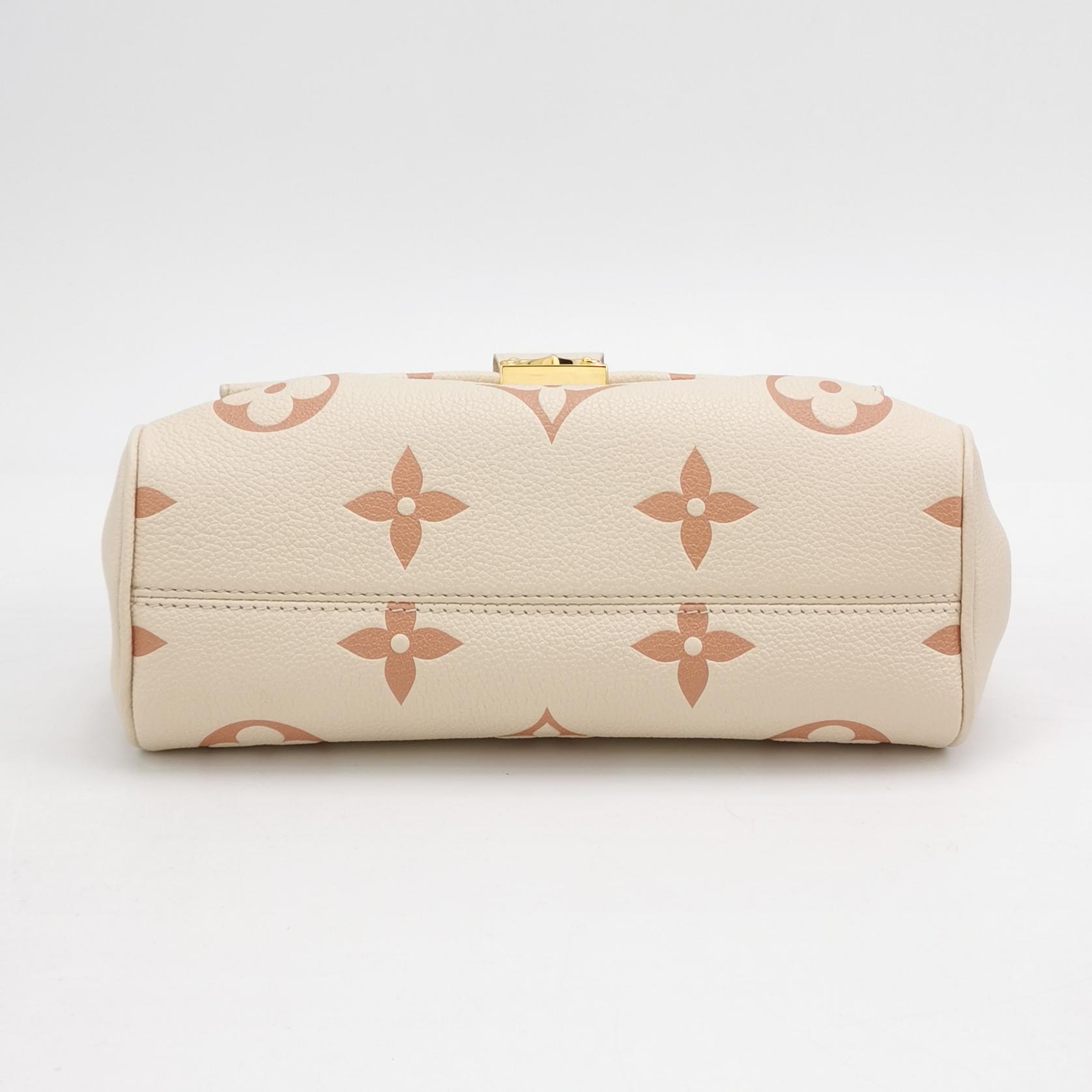 Louis Vuitton(LV) Favorite NM Handbag Bicolor Monogram Empreinte Giant — photo 6 of 11