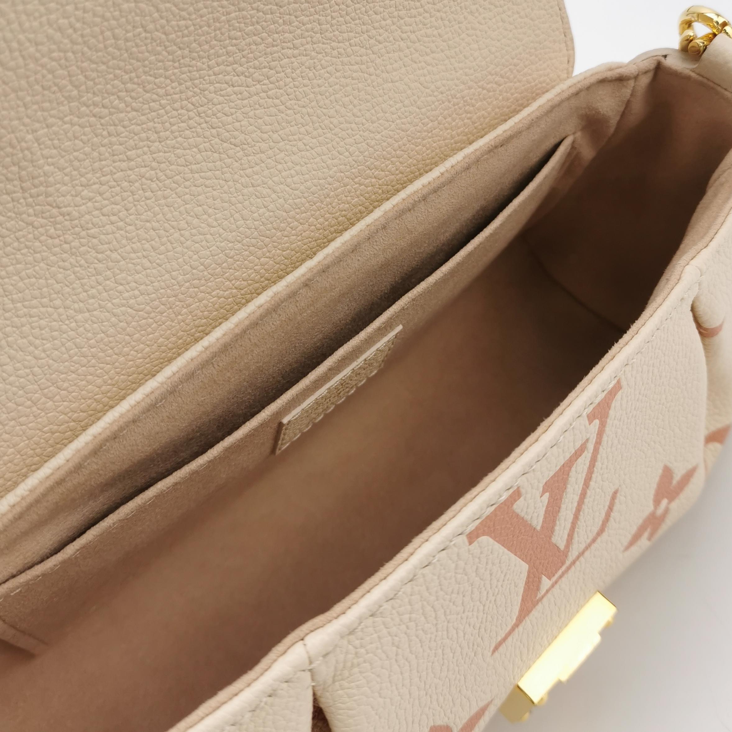 Louis Vuitton(LV) Favorite NM Handbag Bicolor Monogram Empreinte Giant — photo 7 of 11