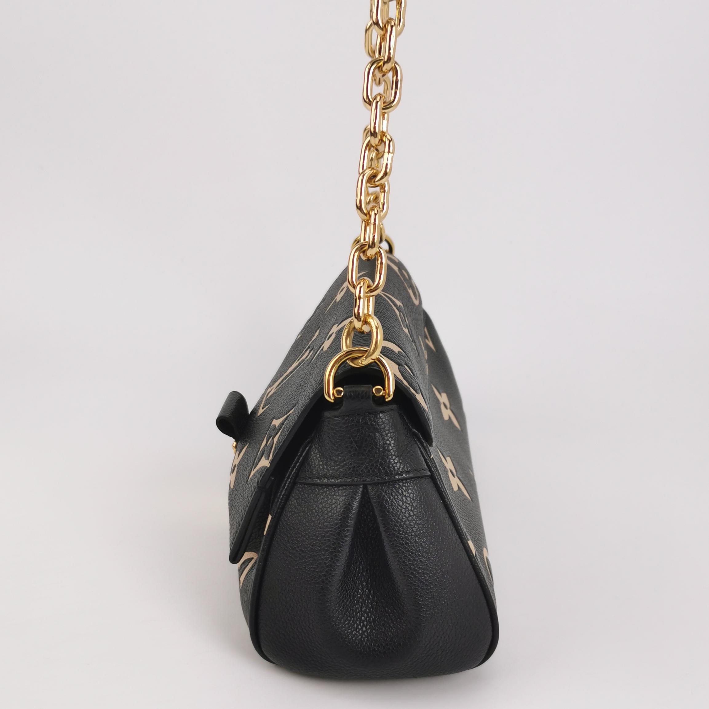 Louis Vuitton(LV) Favorite NM Handbag Bicolor Monogram Empreinte Giant — photo 3 of 15