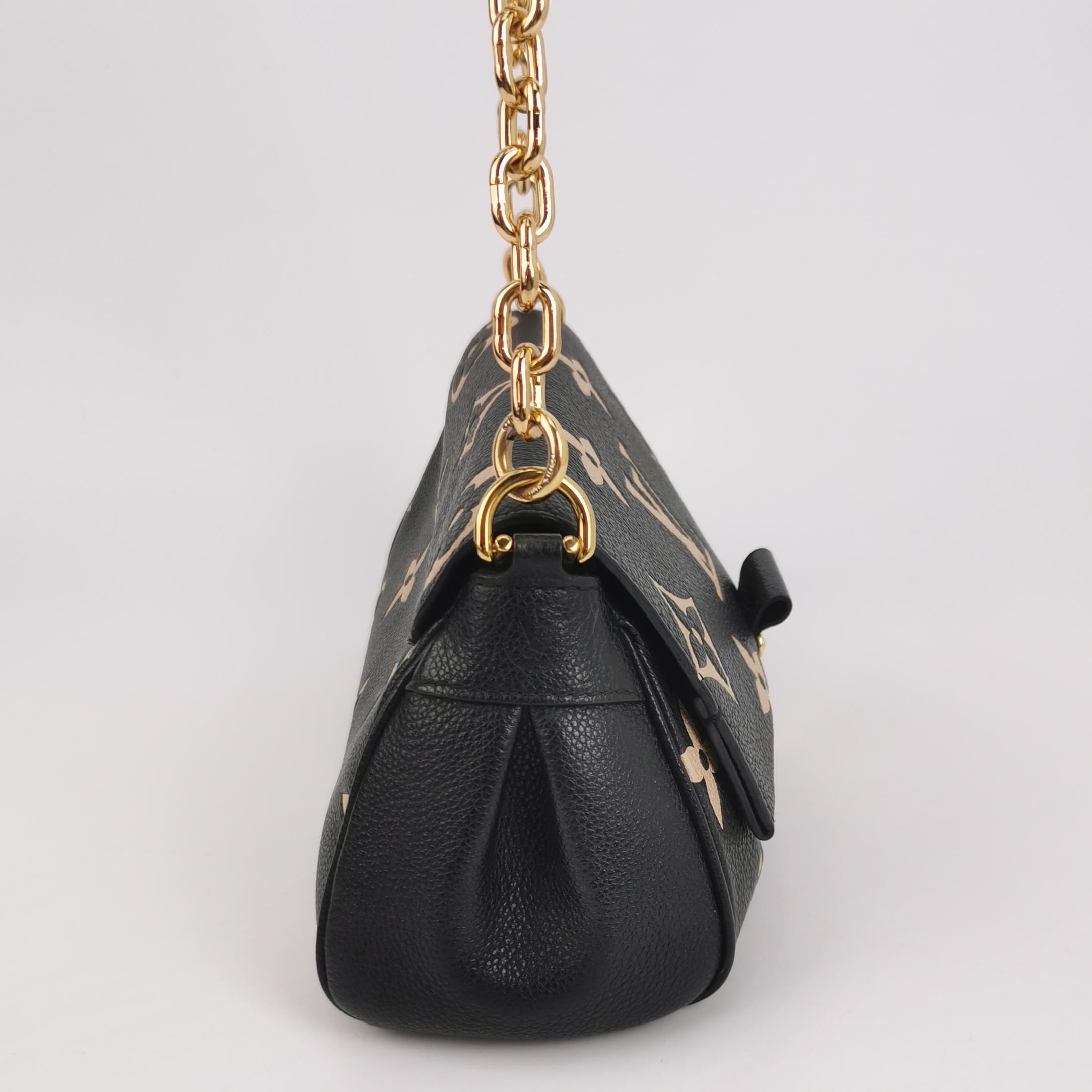 Louis Vuitton(LV) Favorite NM Handbag Bicolor Monogram Empreinte Giant — photo 4 of 15
