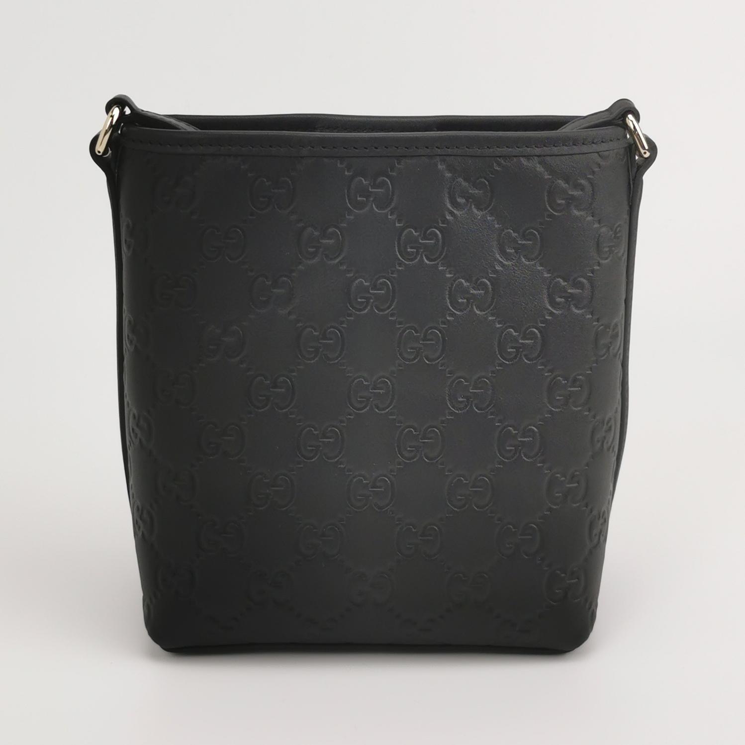 Gucci GG Emblem Bucket Bag GG Debossed Leather Nano — photo 3 of 13