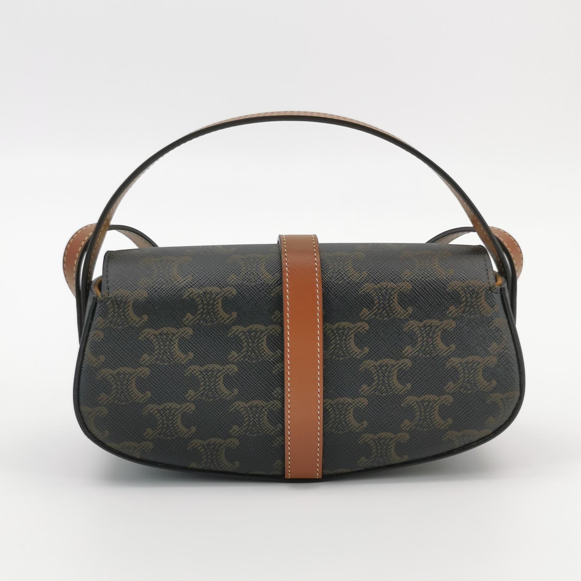 Celine Tabou Clutch with Strap Triomphe Coated Canvas — photo 3 of 14