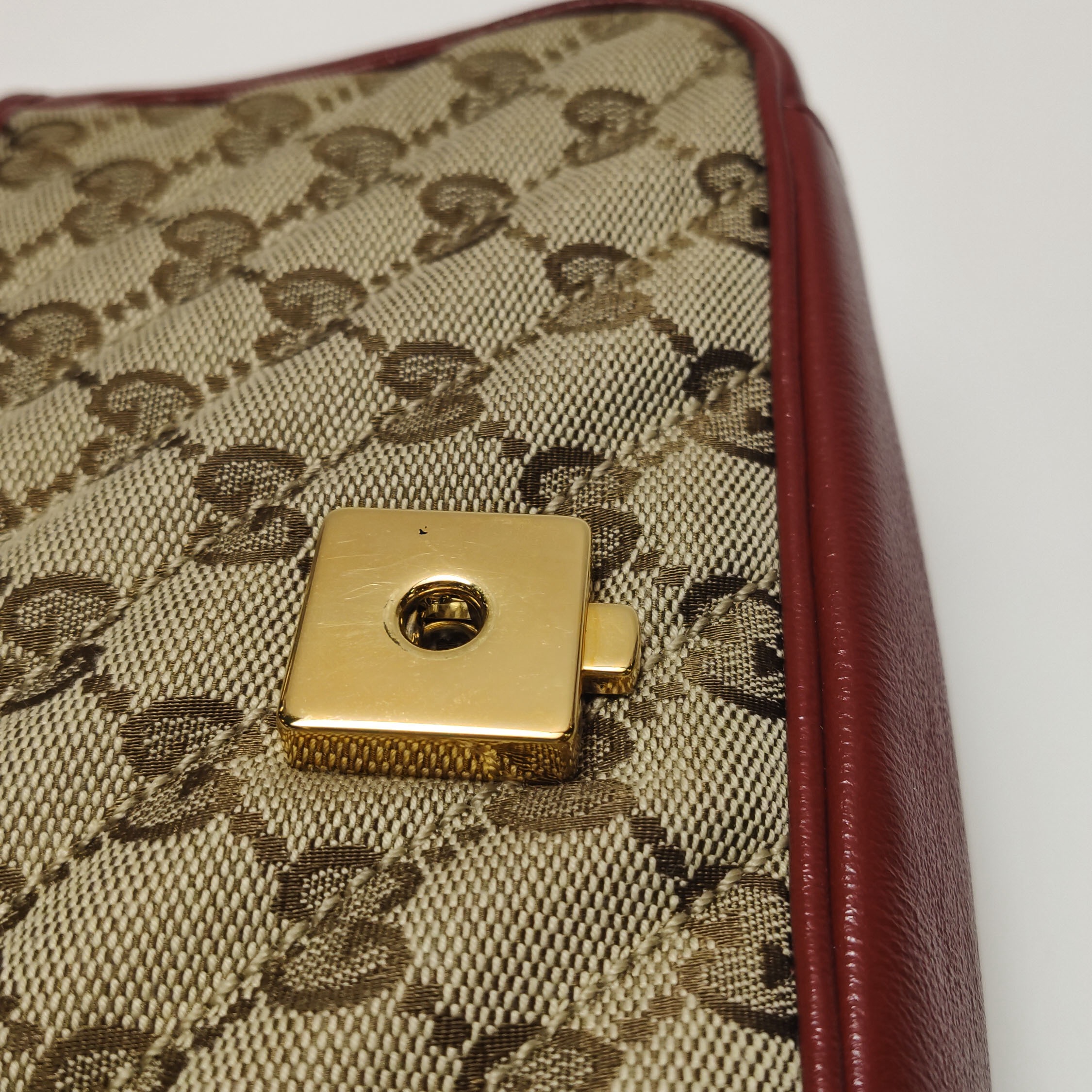 Gucci GG Marmont Flap Bag Diagonal Quilted GG Canvas with Leather Mini — photo 14 of 16
